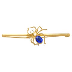 Broche araignée ancienne des années 1890 en or jaune, perles et verre de couleur bleue