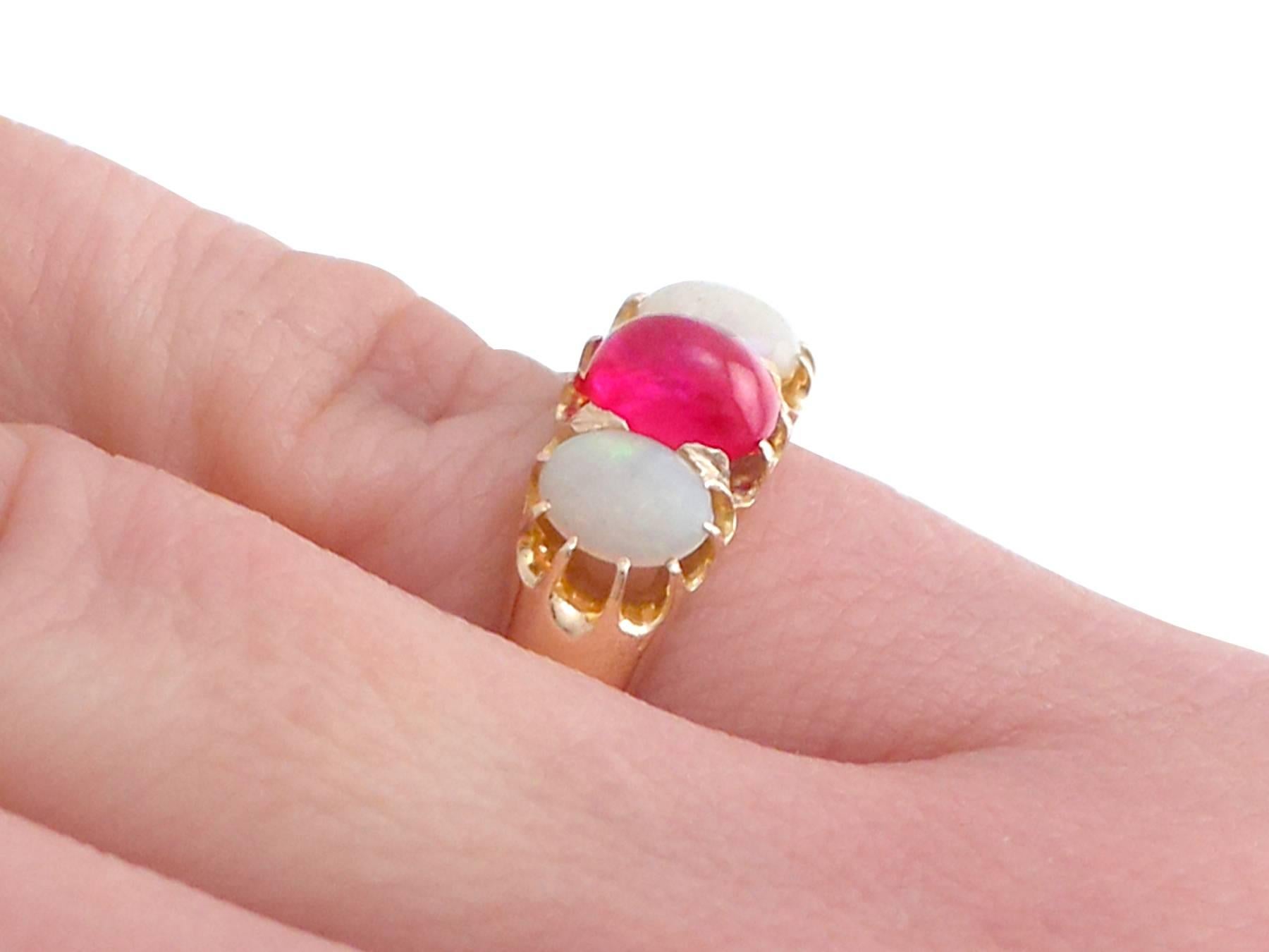 Antique 1890s Cabochon Cut Ruby and Opal Yellow Gold Trilogy Ring In Excellent Condition For Sale In Jesmond, Newcastle Upon Tyne