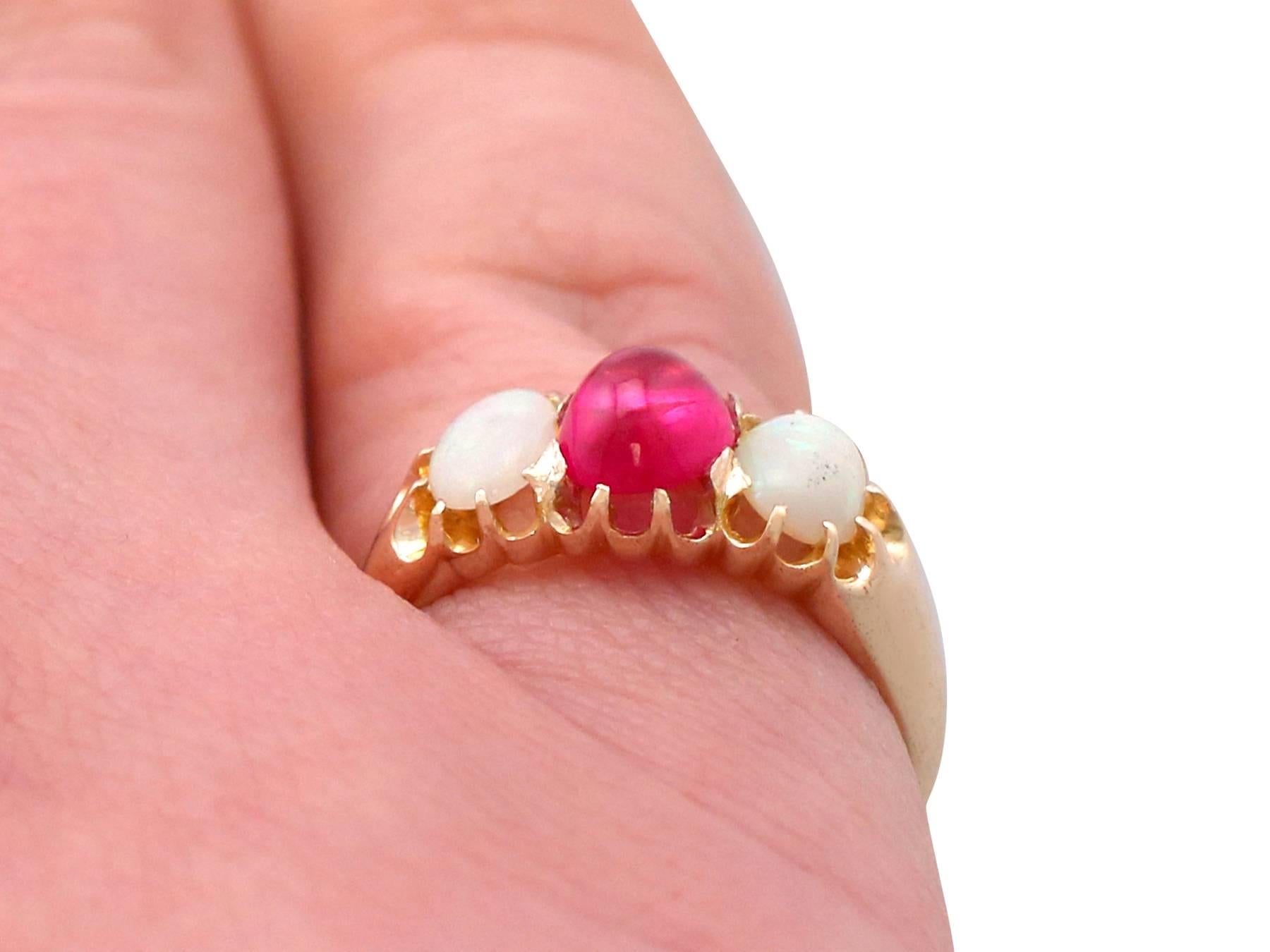 Women's or Men's Antique 1890s Cabochon Cut Ruby and Opal Yellow Gold Trilogy Ring For Sale