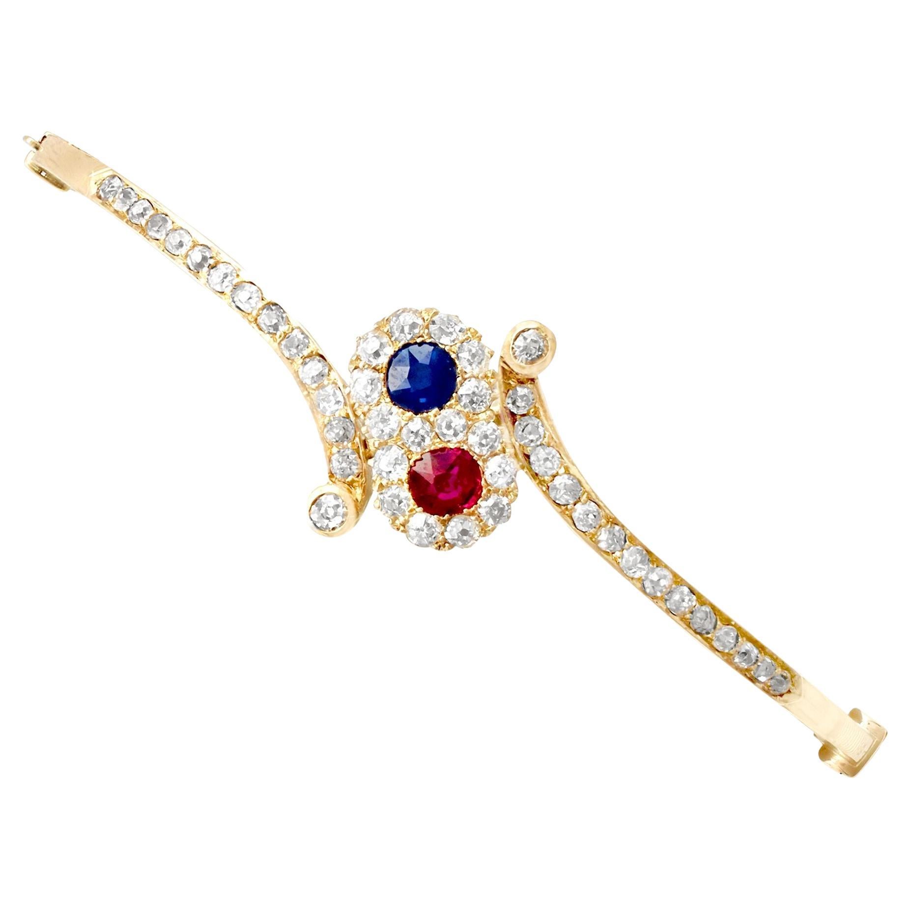 Antique 1890s Ruby and Sapphire 1.50 Carat Diamond and Yellow Gold Bangle For Sale