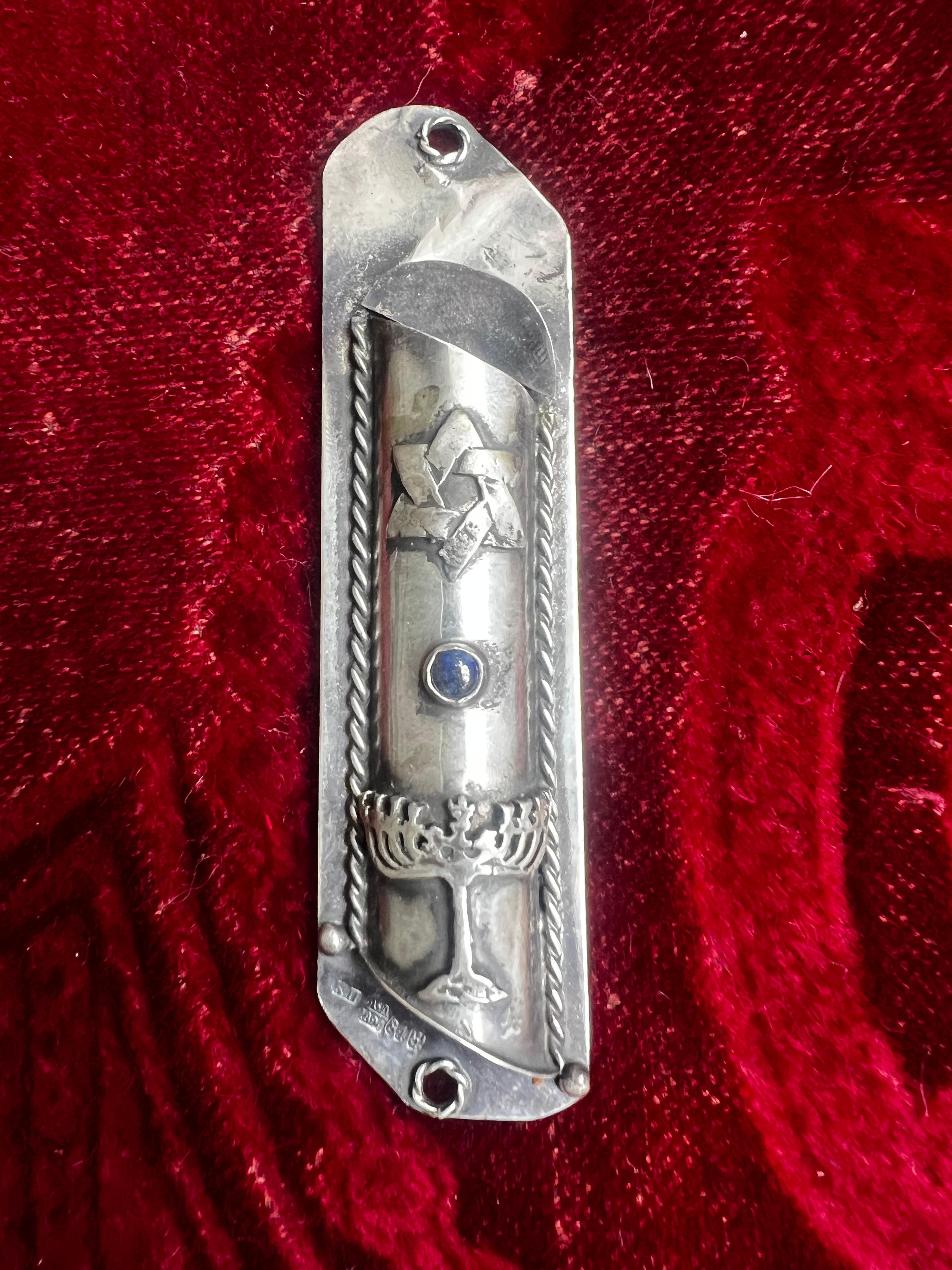 This is a very rare sterling silver Judaical Mezuzah which was found in Vienna, Austria  and survived WW2 among other historical Religious Judaical items (you can find them in our listings). It opens from the top and can be mounted on the wall. On