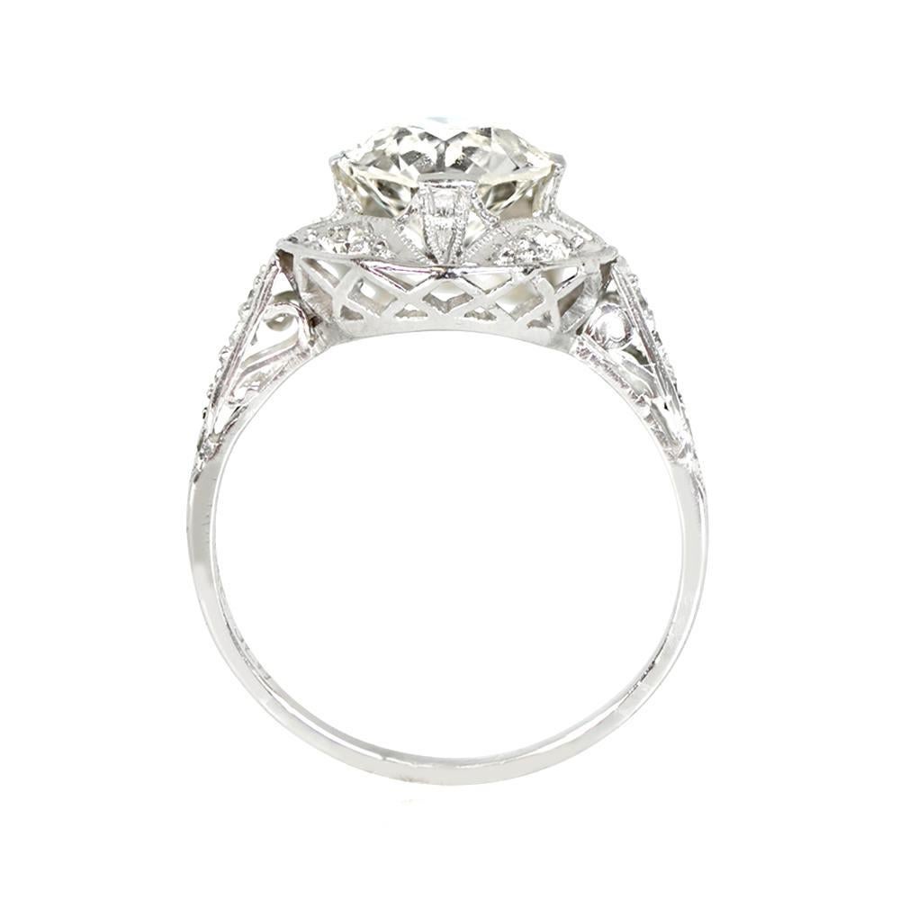 Art Deco engagement ring with a 1.89 carat old European cut diamond center stone, K color and VS1 clarity. The ring features side diamonds set along the shoulders and sides, with openwork filigree and milgrain in the under gallery. Total approximate