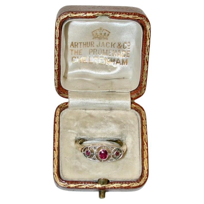 Antique 18ct Gold 3 Stone Ruby Ring with 4 Small Rose Cut Diamonds C 1900 For Sale