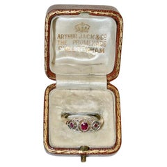 Antique 18ct Gold 3 Stone Ruby Ring with 4 Small Rose Cut Diamonds C 1900