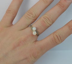 Antique 18 Carat Gold and Platinum Opal Ball Toi et Moi Ring with Diamonds
