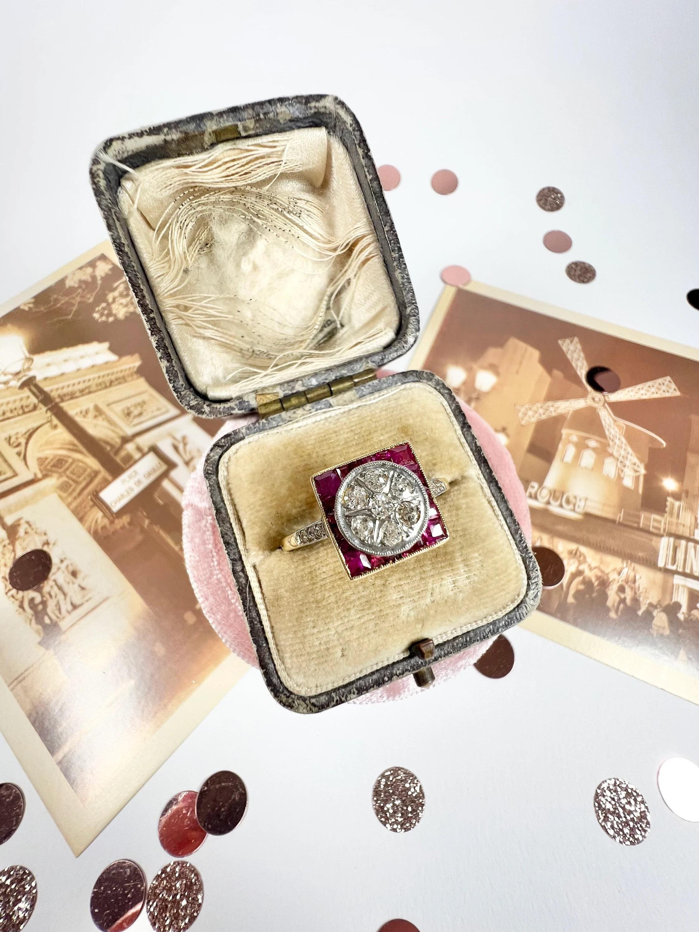 Antique Art Deco Ring

18ct Gold Tested 

Circa 1920’s

Fabulous, Art Deco ring. A beautiful square setting filled with natural calibrated rubies & a centre circle of natural, sparkling diamonds. 
Complimented beautifully with diamond shoulders, set