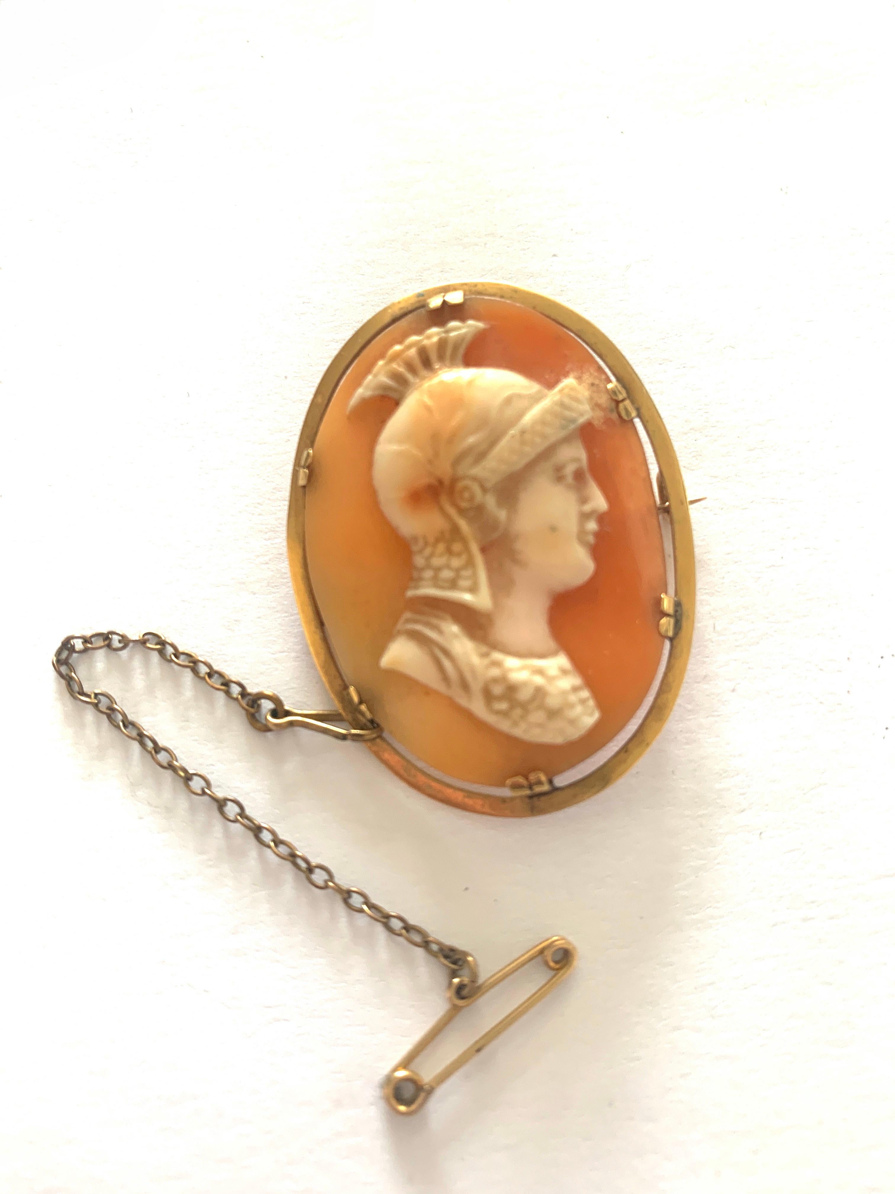 Antique 18ct Gold Centurion Cameo Brooch

This Edwardian natural shell hand carved cameo
depicts a handsome centurion of Roman Empire design.

The gold settings is 18ct Gold and is marked 