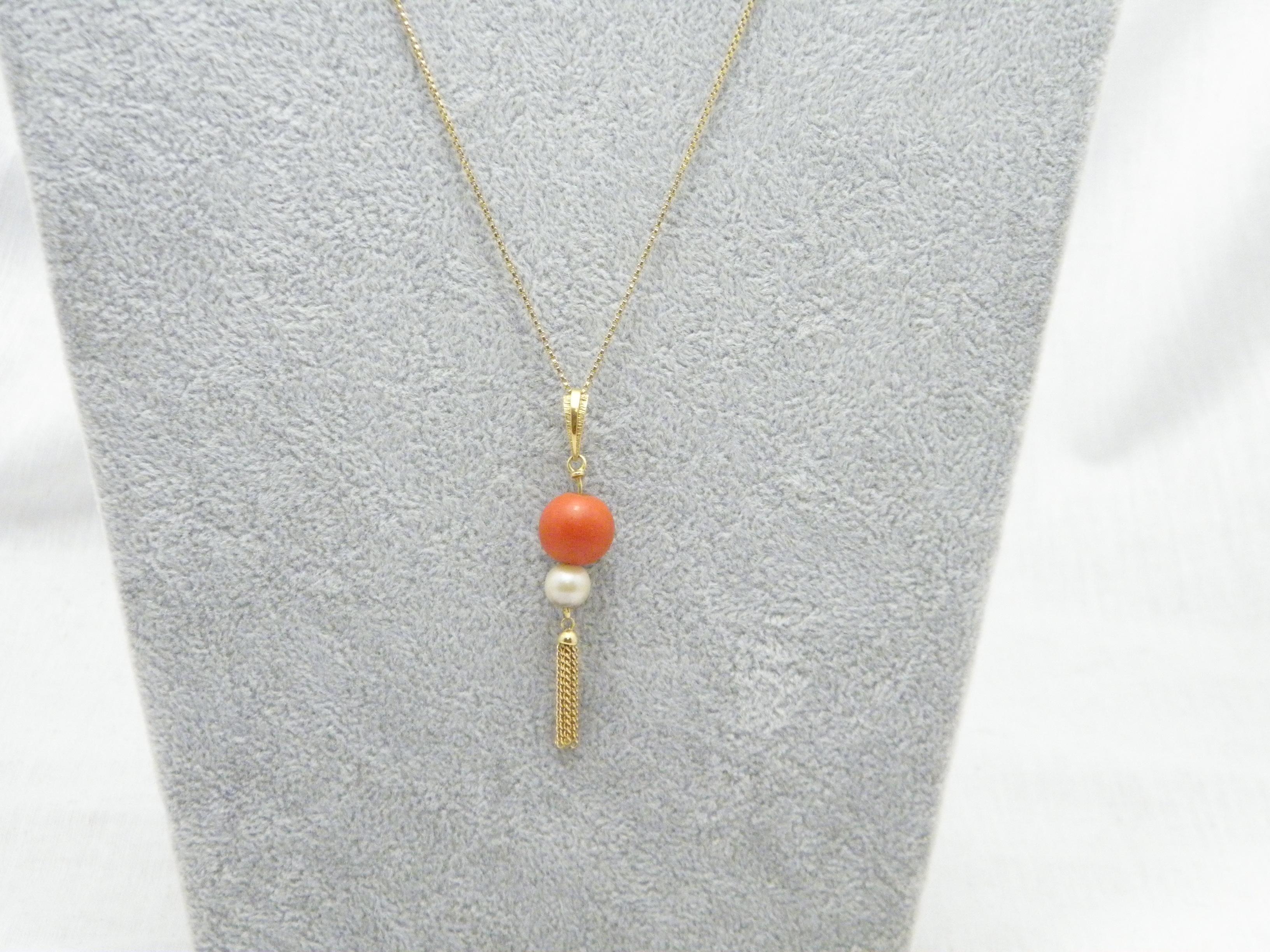 If you have landed on this page then you have an eye for beauty.

On offer is this gorgeous

18CT GOLD HEAVY CORAL AND PEARL TASSLE PENDANT NECKLACE

PENDANT DESCRIPTION
DETAILS
Material: Solid 18ct (750/000) yellow gold
Style: Victorian tassle