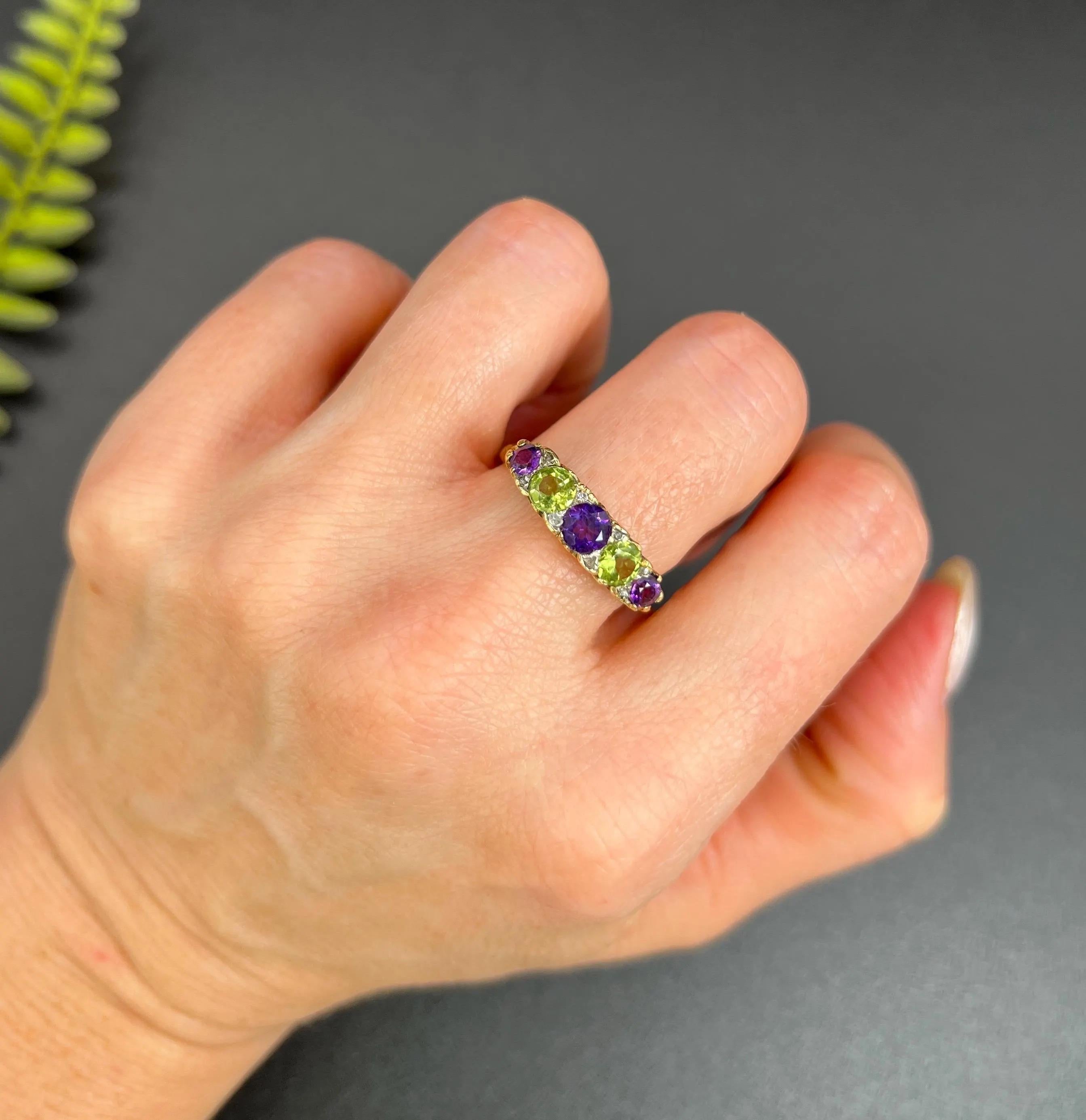 Antique Suffragette Ring 

18ct Gold

This stunning 18ct yellow gold Edwardian era suffragette ring is a true testament to craftsmanship and history. The ring features a captivating arrangement of alternating amethyst and peridot stones, beautifully