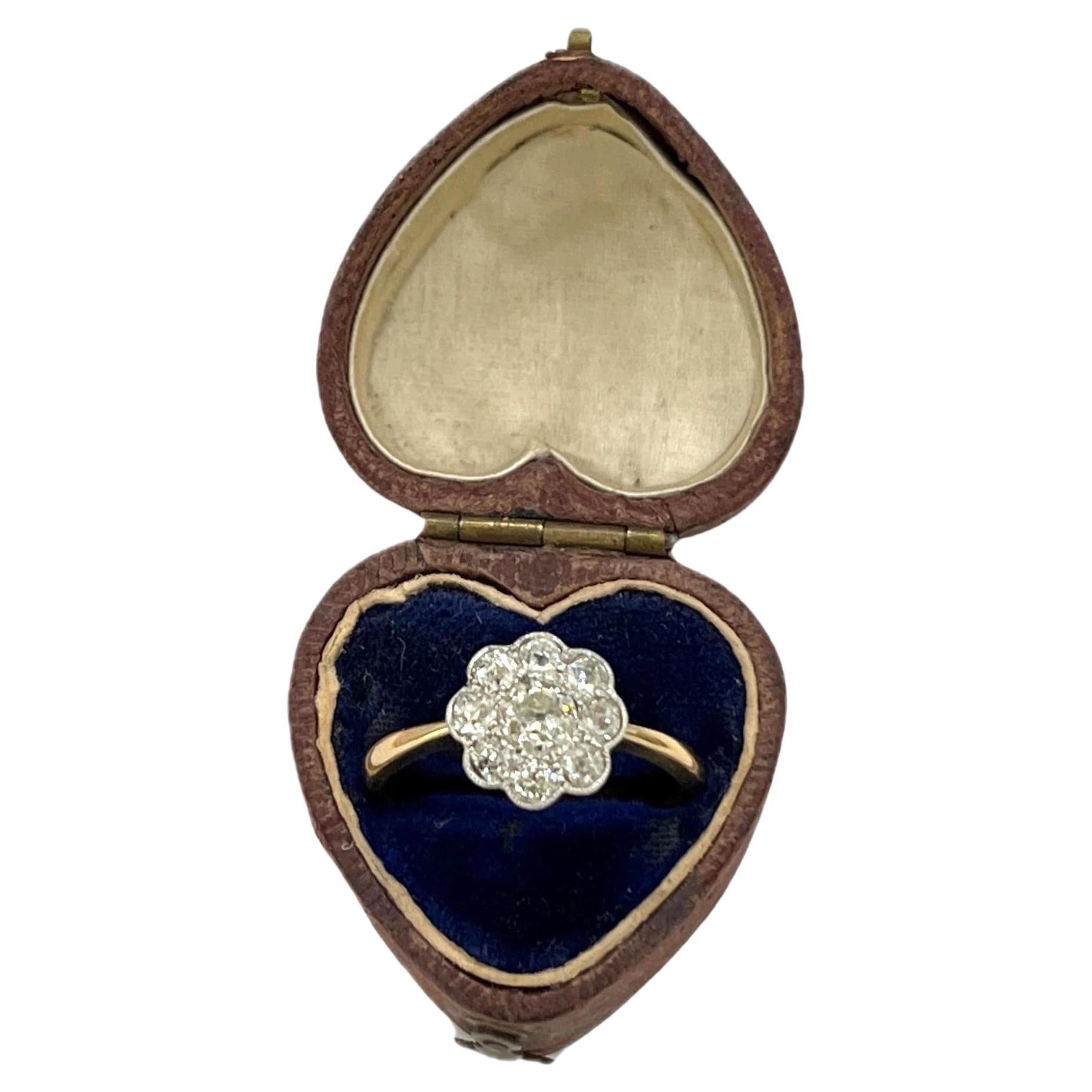 Antico anello a margherita con diamante in oro 18 ct.