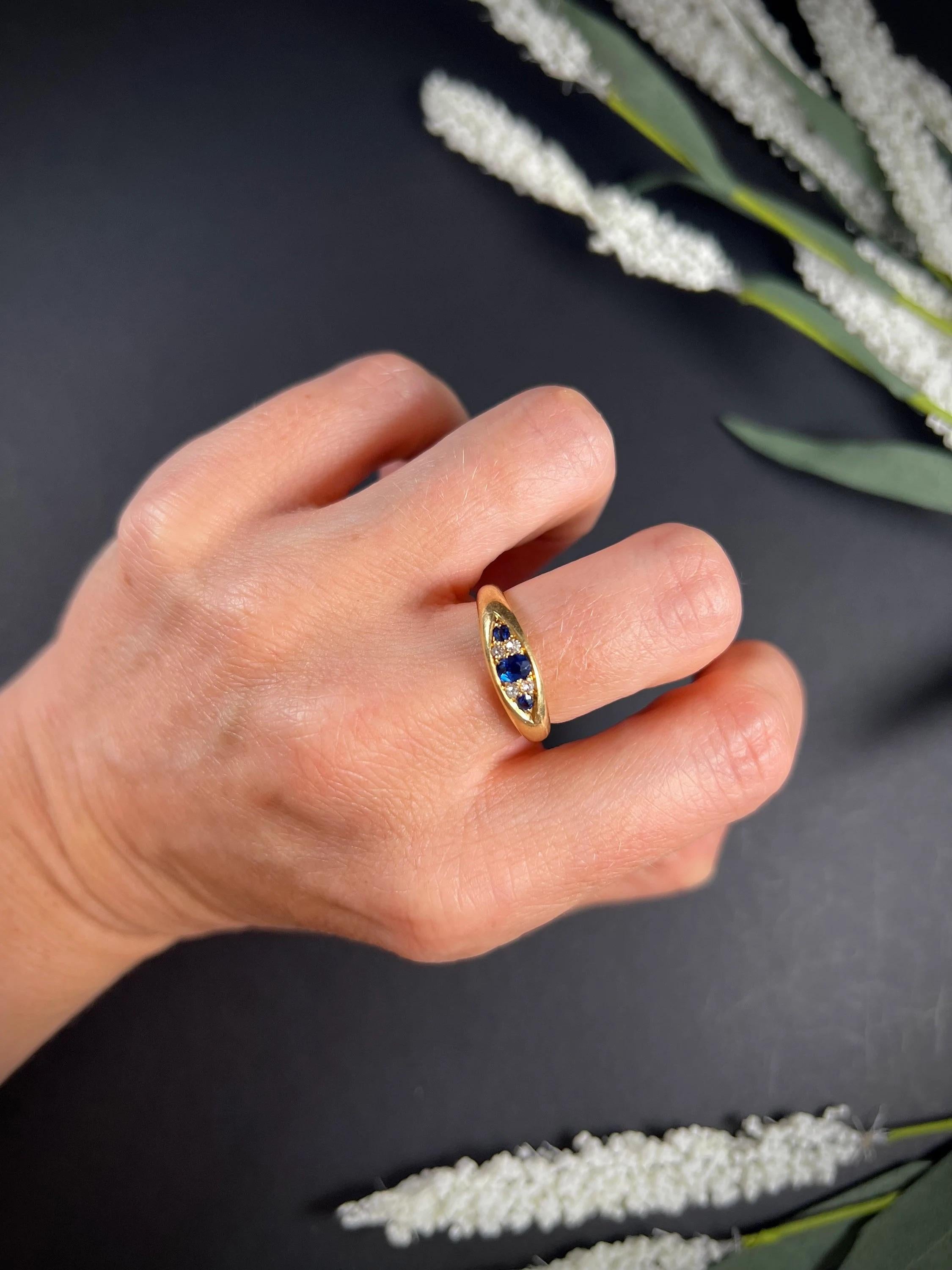 Antique Sapphire and Diamond Ring 

18ct Gold Stamped 

Hallmarked Birmingham 1905

Makers Mark H & S 

Beautiful, Edwardian ring. Features alternating, natural sapphire & diamond stones, set in to a lovely boat shape of a solid, yellow gold band.