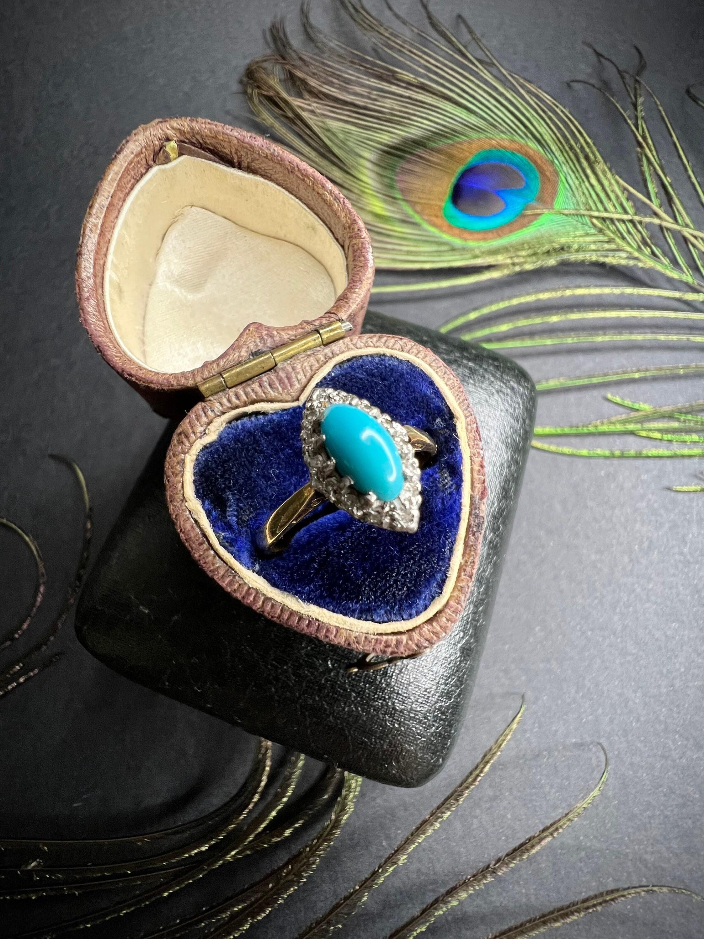 Antique Turquoise Marquise Ring

18ct Gold 

Circa 1900

Beautiful, Edwardian Marquise Shaped Turquoise Stone. Surrounded by Pretty Rose Cut Diamonds. 

Face of The Ring Measures Approx Height 12.7mm & Width 7mm

UK Size N 

US Size 7

Can be