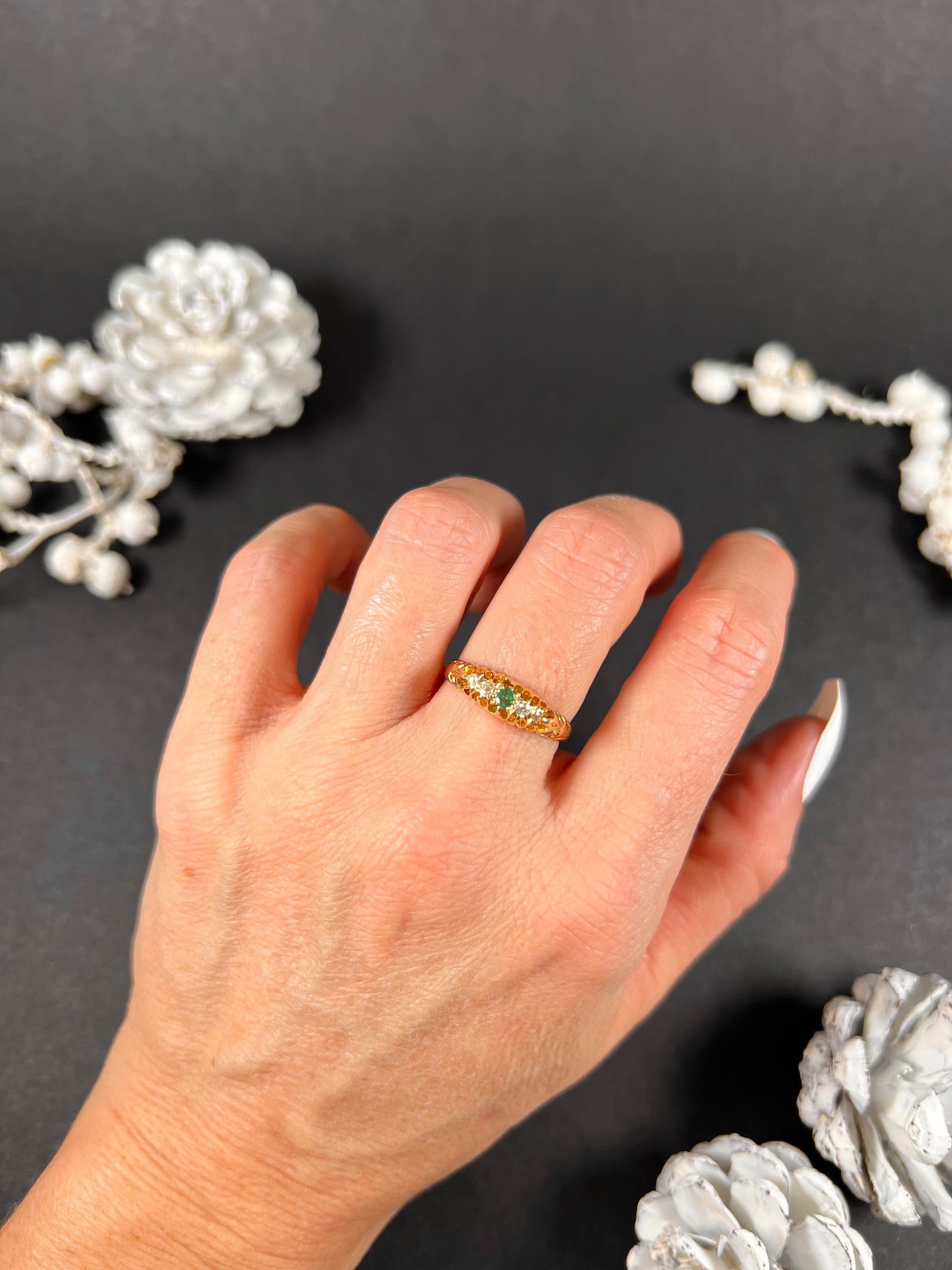 Antique Emerald & Diamond Ring

18ct Gold Stamped 

Hallmarked London 1907

Makers Mark J P

This stunning 18ct yellow gold gypsy ring boasts a captivating centre emerald and two natural diamonds on either side. The emerald's rich green hue