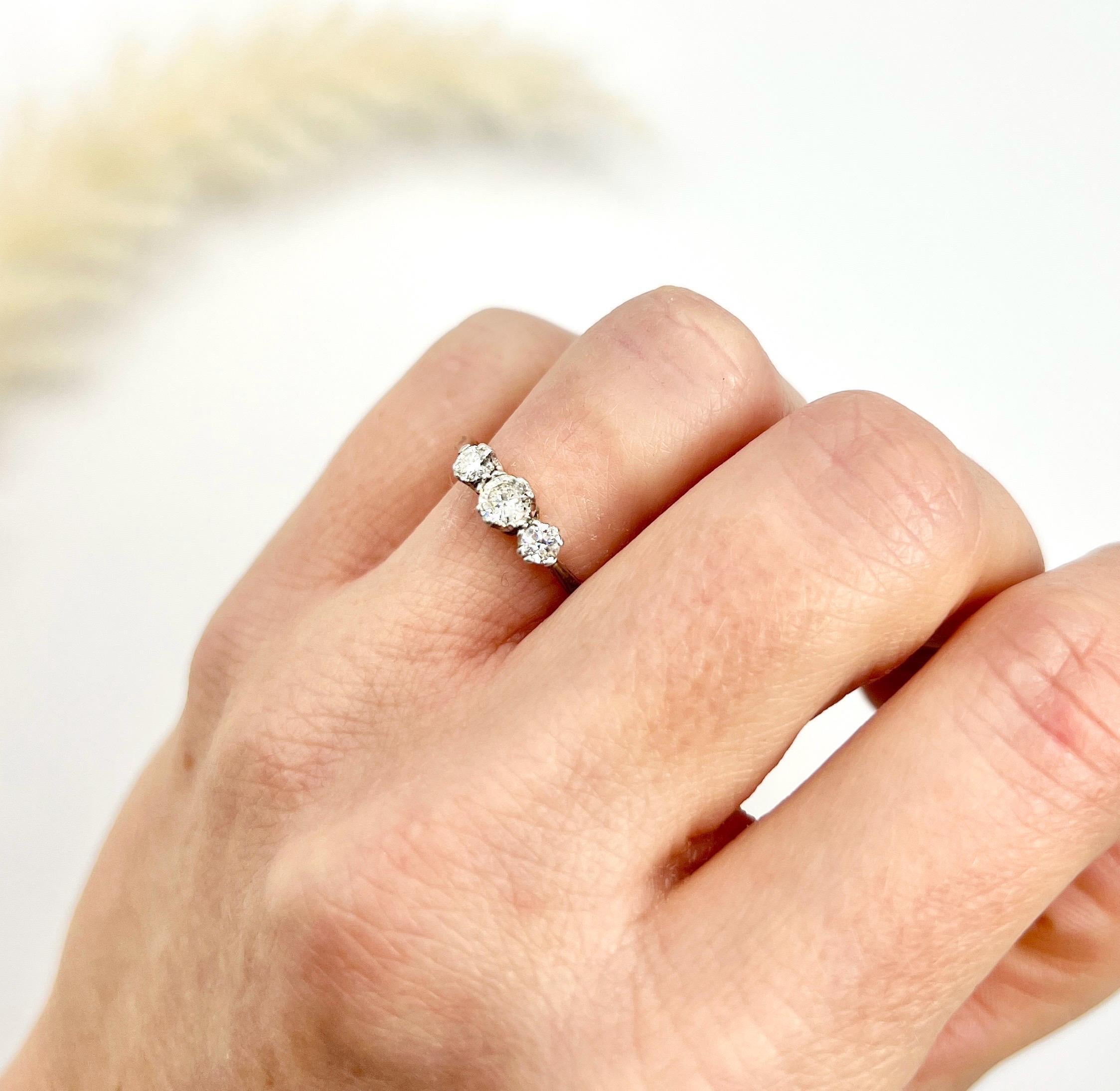 Diamond 3 Stone Ring 

18ct Gold & Platinum

Circa 1920s

Presenting a stunning 18ct Yellow Gold and Platinum Trilogy Engagement Ring, a timeless piece that captures the elegance of the 1920s. This exquisite ring features three dazzling natural