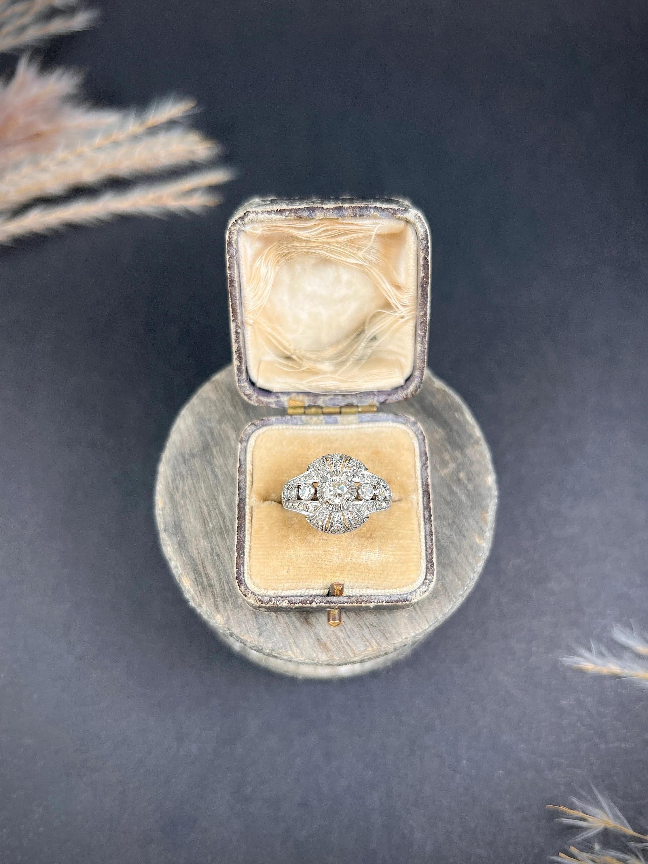 Antique Diamond Bombe Ring

18ct Gold & Platinum Tested

Circa 1920s

There are rubbed foreign hallmarks on the outside of the band.

Introducing a stunning 18ct gold and platinum Art Deco ring. This fabulous bombe-shaped design showcases a dazzling