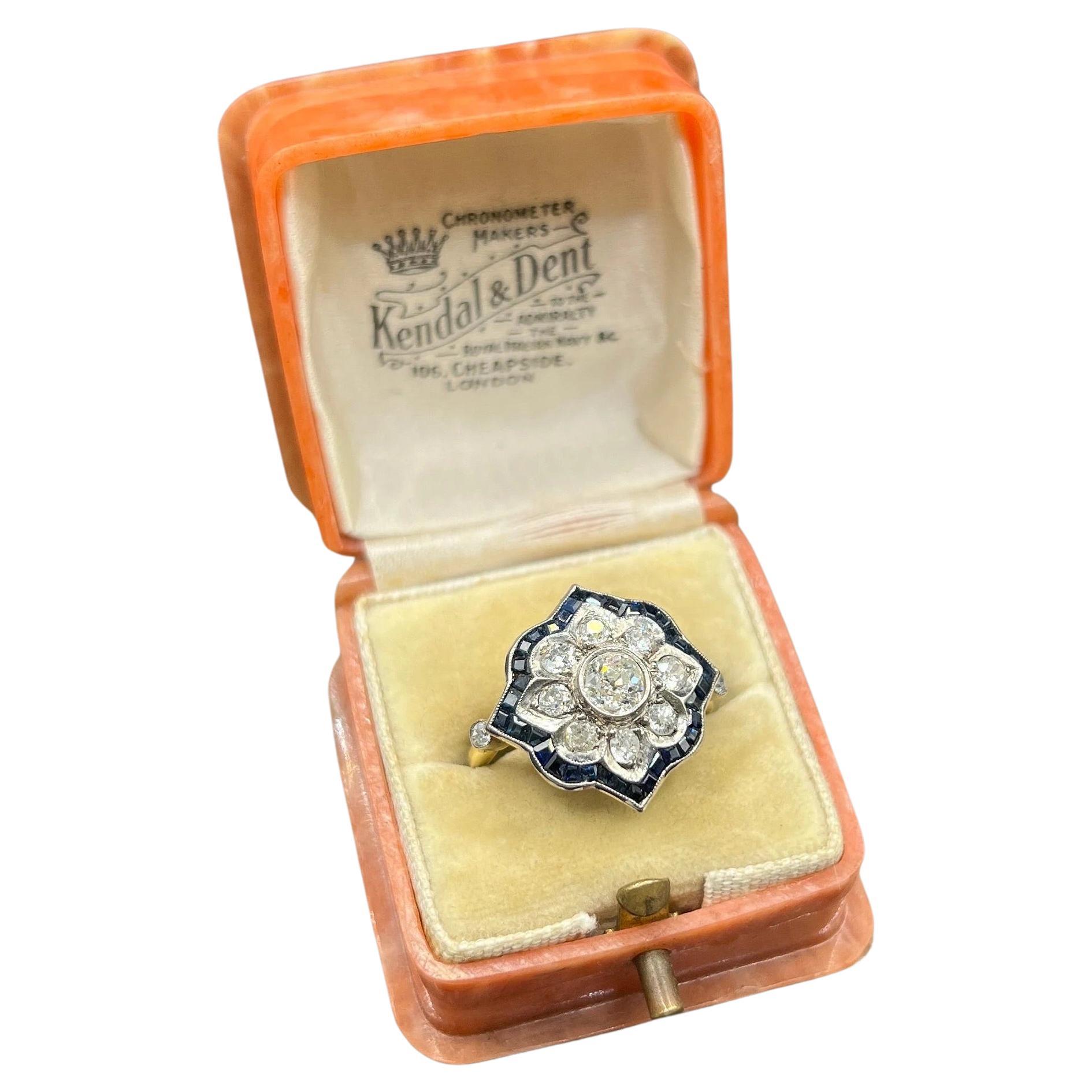 Antiker Ring aus 18 Karat Gold und Platin, 1940er Jahre, Blumenmuster, Saphir, Diamant
