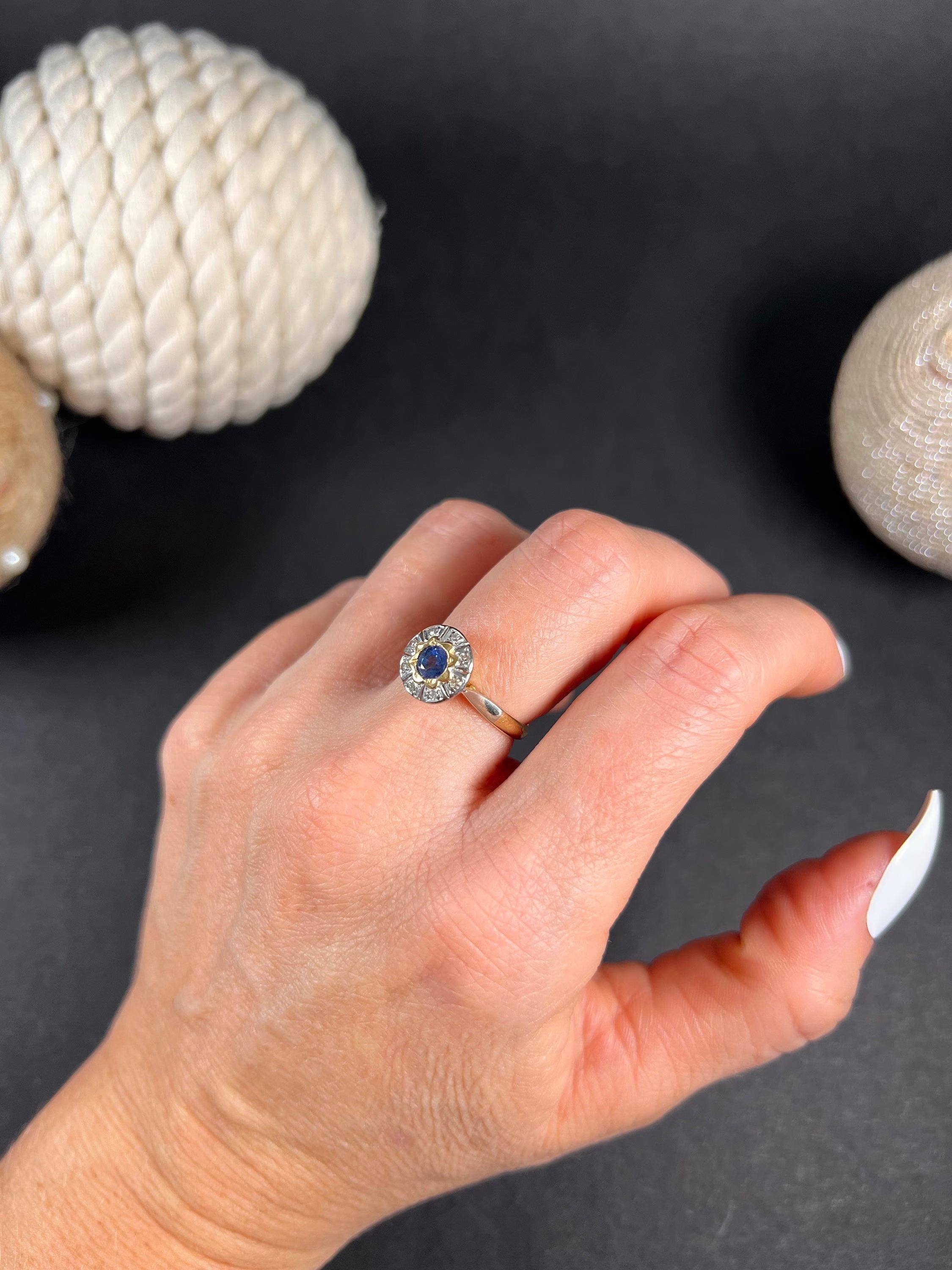 Antique Cluster Ring

18ct Gold & Platinum Stamped 

Circa 1920s

This stunning art deco ring is a true masterpiece that will make any fashionista swoon. Crafted from 18ct gold and platinum, this ring boasts a natural sapphire at its centre,