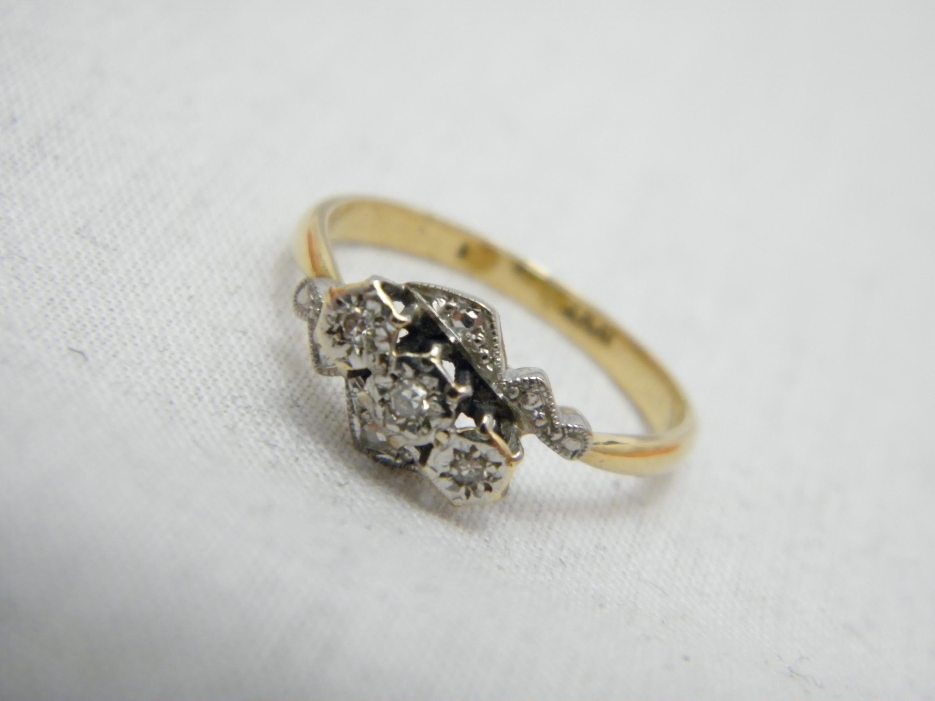 If you have landed on this page then you have an eye for beauty.

On offer is this gorgeous
18CT GOLD AND 950 PLATINUM DIAMOND BYPASS TRILOGY ENGAGEMENT RING

DETAILS
Material: 18ct 750/000 Yellow Gold with 950/1000 Platinum Pt Mount
This ring has a