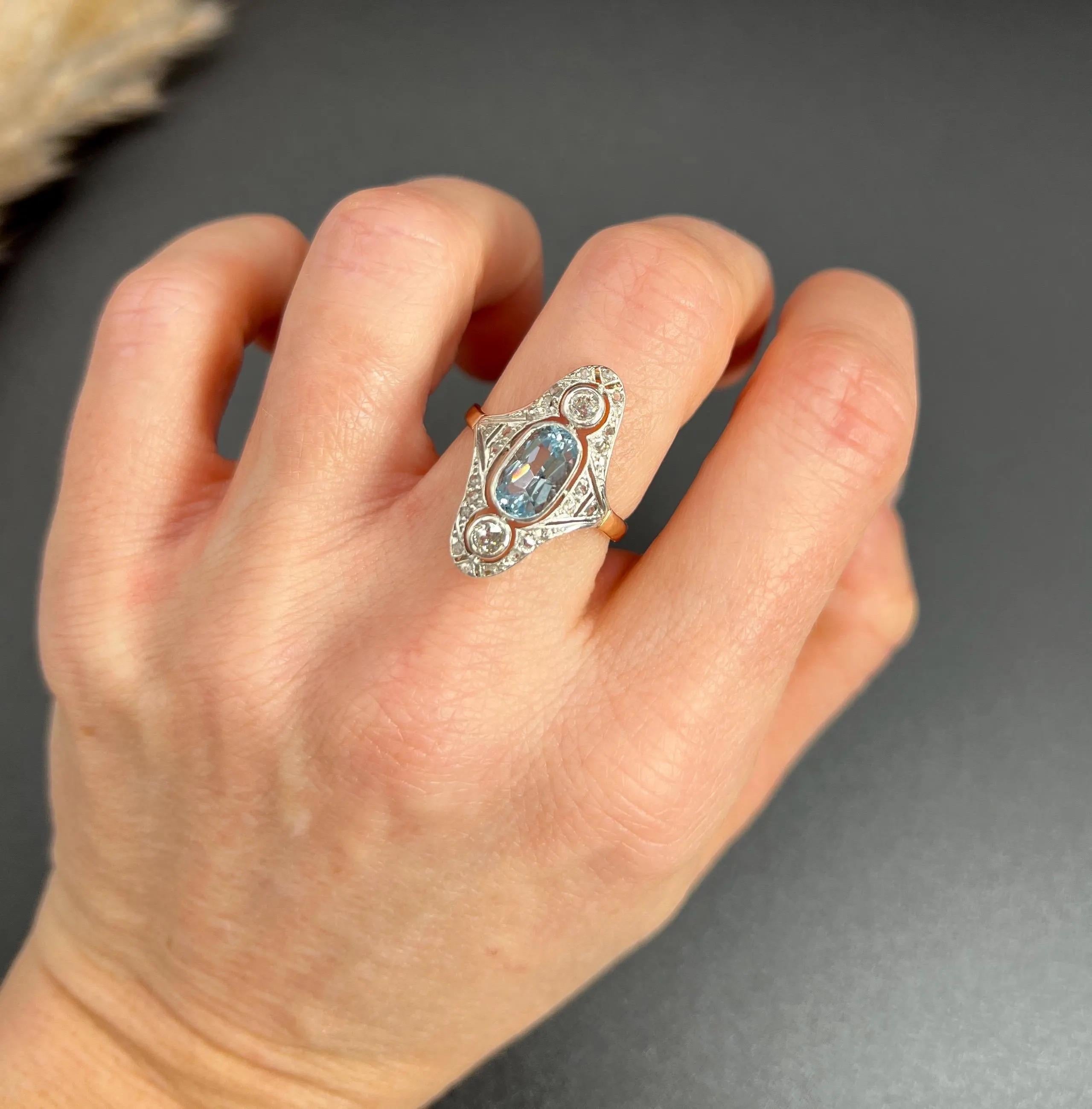 Antique Aquamarine & Diamond Ring 

18ct Rose Gold & Platinum 

Circa 1910

Step into elegance with this stunning Edwardian up-finger ring, crafted from 18ct rose gold and platinum. This exquisite piece showcases a fabulous open-work design that