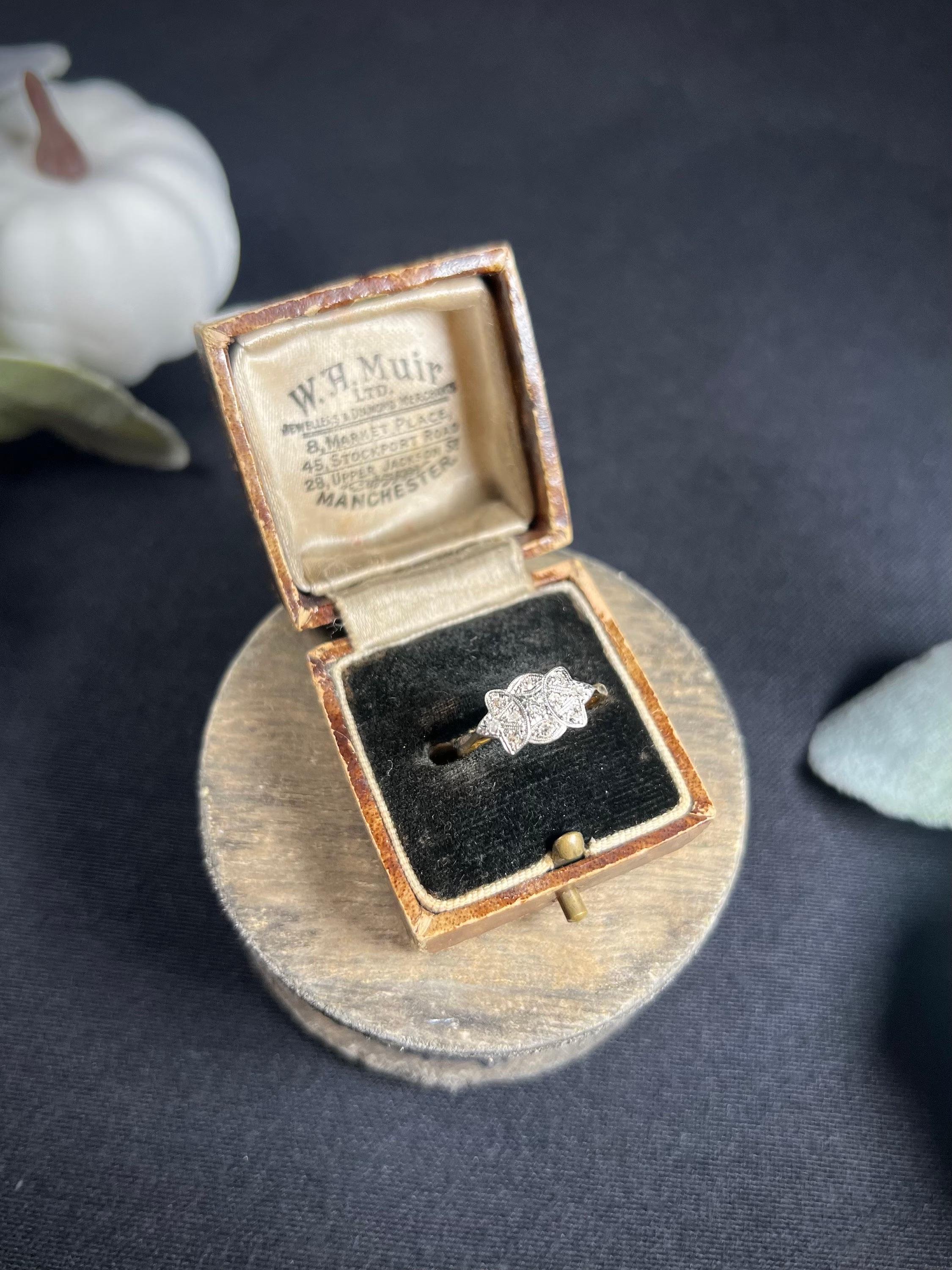 Antique Diamond Illusion Ring 

18ct Gold & Platinum Stamped

Circa 1910

Makers Mark H & S

This stunning Edwardian ring boasts a timeless design that is sure to turn heads. Crafted from 18ct gold and platinum, the ring features a beautiful