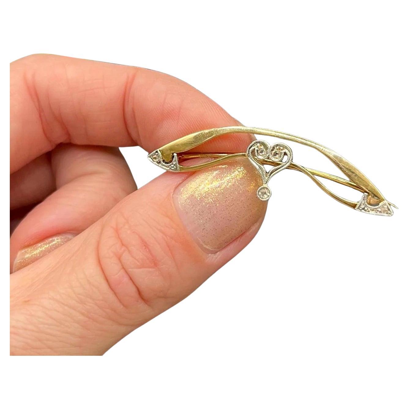 Antiguo broche eduardiano de corazón de diamantes en oro y platino de 18 ct, circa 1910