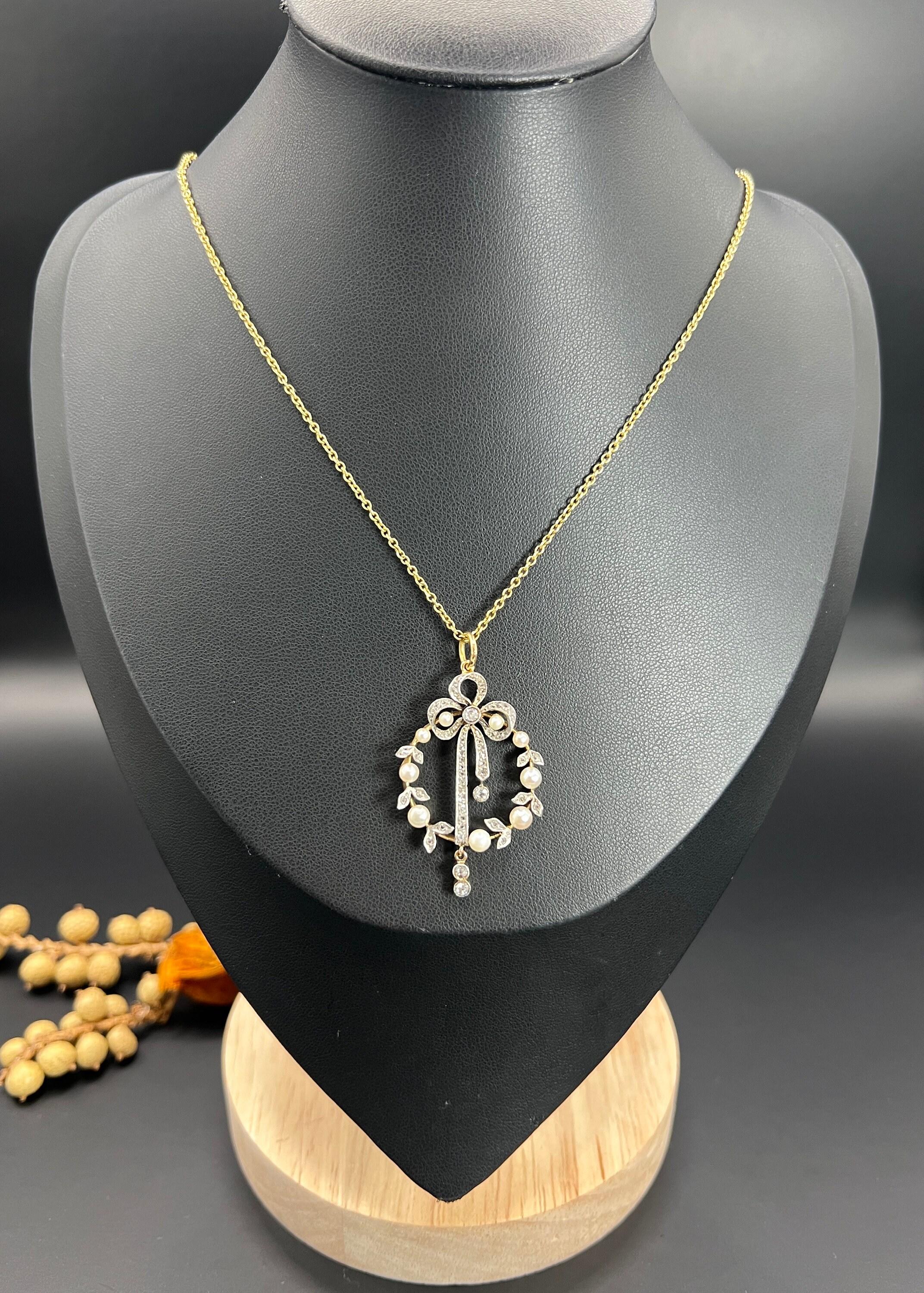 Pendentif ancien en or 18 carats et platine, époque édouardienne, avec nœud papillon en diamant et perle en vente 3