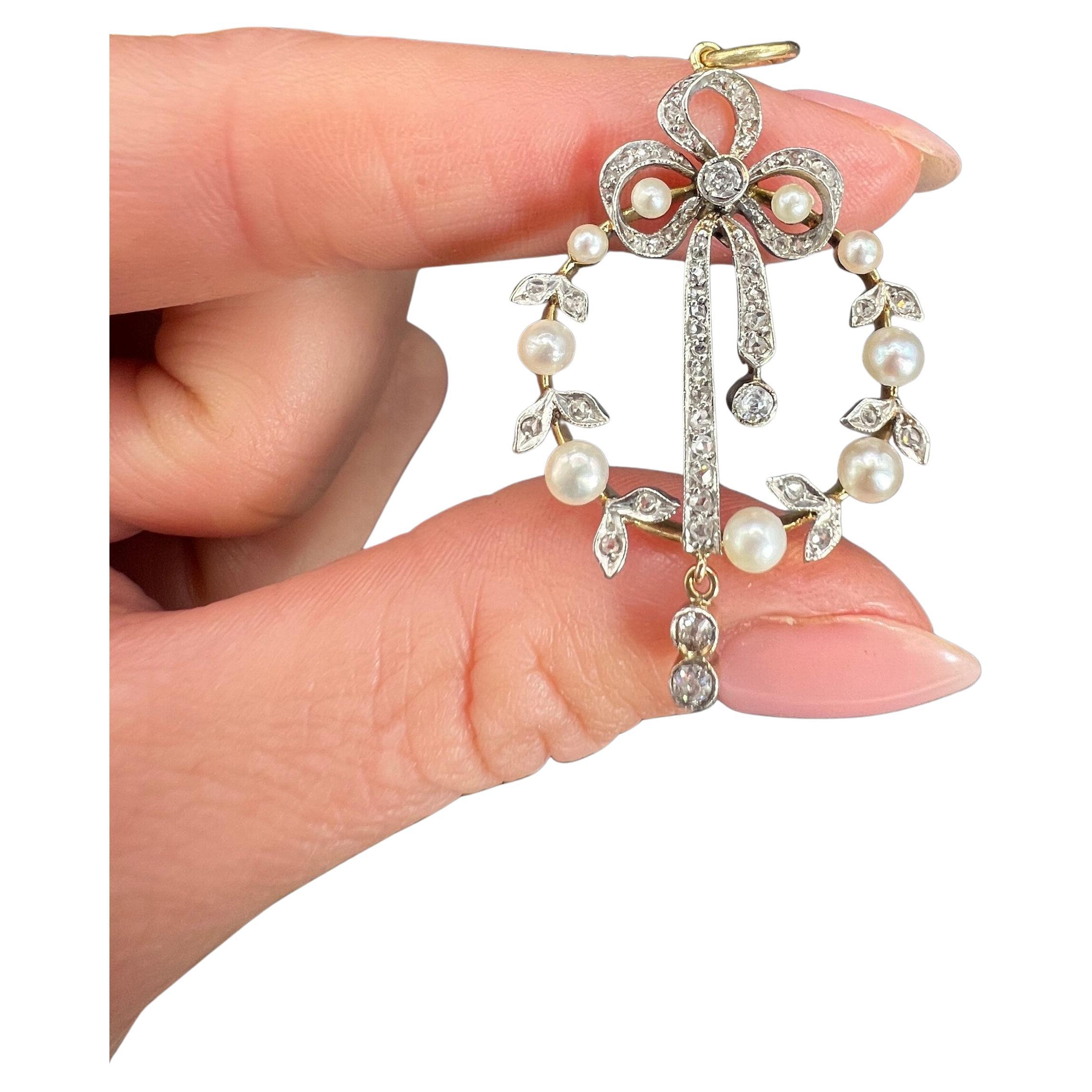 Antique 18ct Gold & Platinum, Edwardian era Diamond and Pearl Bow Pendant
