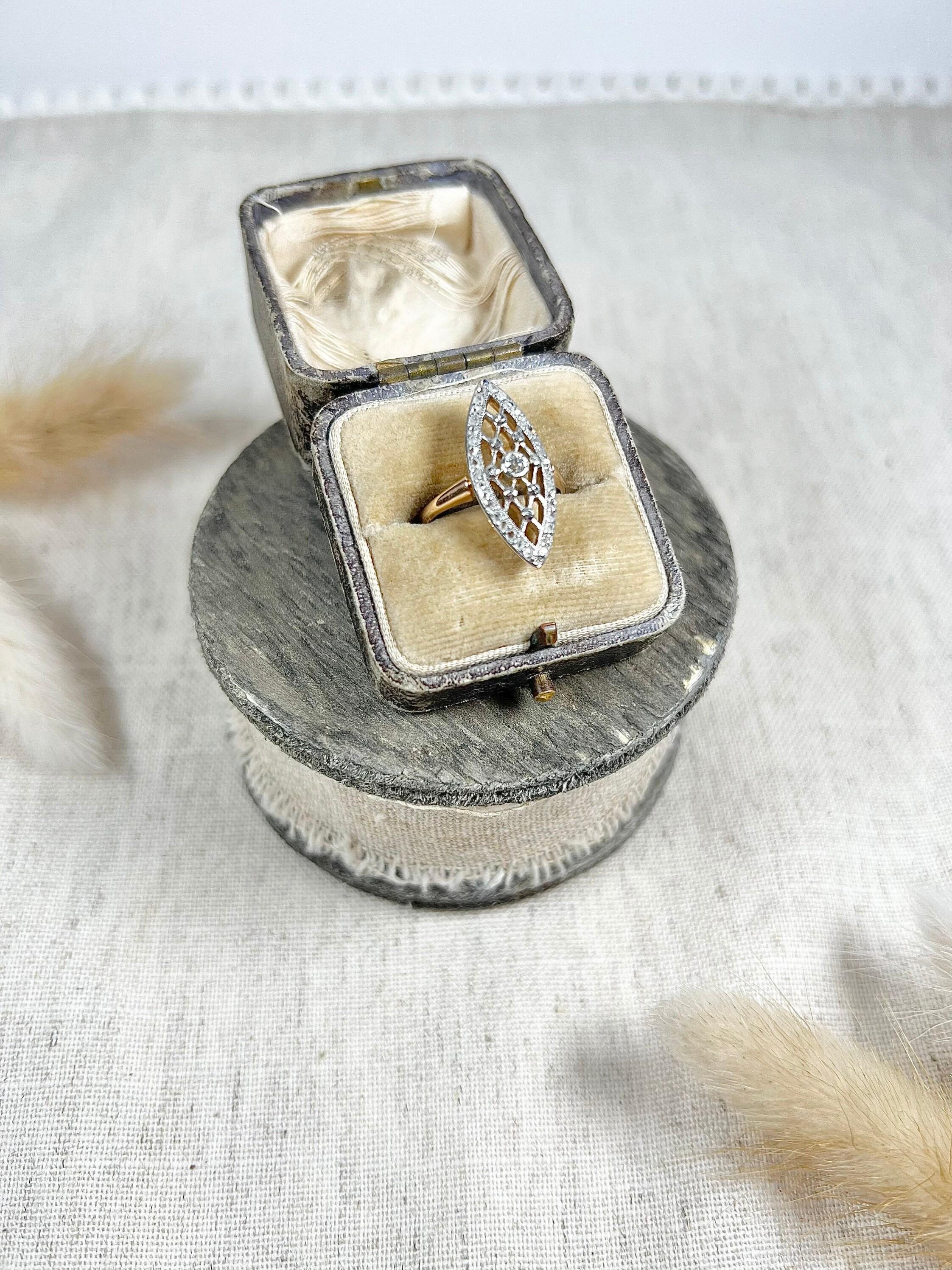 Antique Diamond Ring 

18ct Gold & Platinum 

Circa 1910

Fabulous, Edwardian marquise shaped ring. Beautifully handmade setting with gorgeous, platinum, lattice detailing. Set with a centre, natural European cut diamond & a lovely marquise shaped