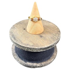 Anello antico in oro 18ct e platino edoardiano con diamante taglio vecchio e margherita incrociata
