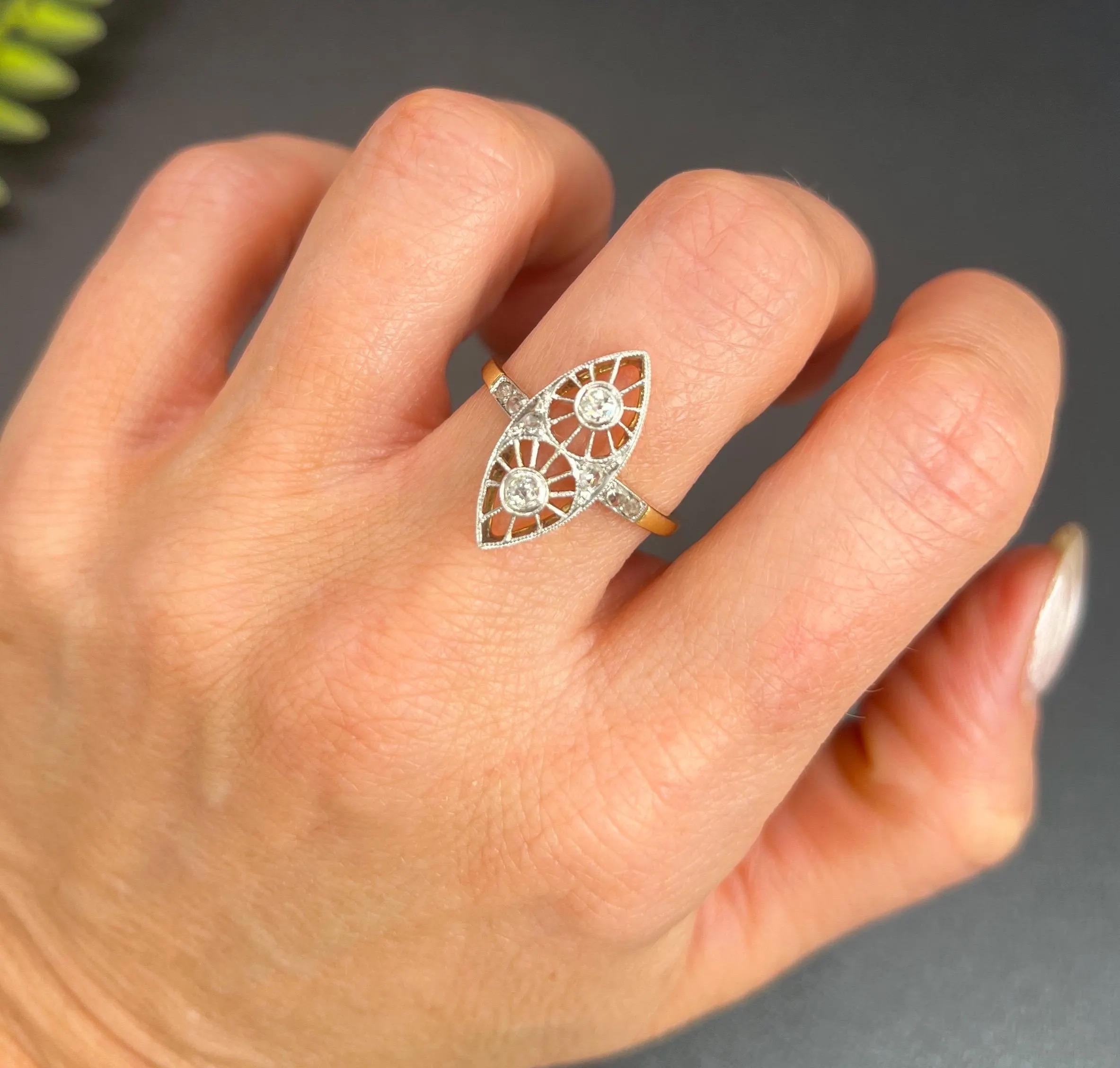 Antique Diamond Ring 

18ct Gold & Platinum

Circa 1910

Step back in time with this exquisite Edwardian-era ring, masterfully crafted from 18ct gold and platinum. The stunning marquise/navette shape features a captivating openwork design,
