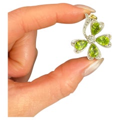 Antiguo Colgante Eduardiano de Oro de 18 ct y Platino de Trébol de 4 Hojas de Peridoto y Diamantes