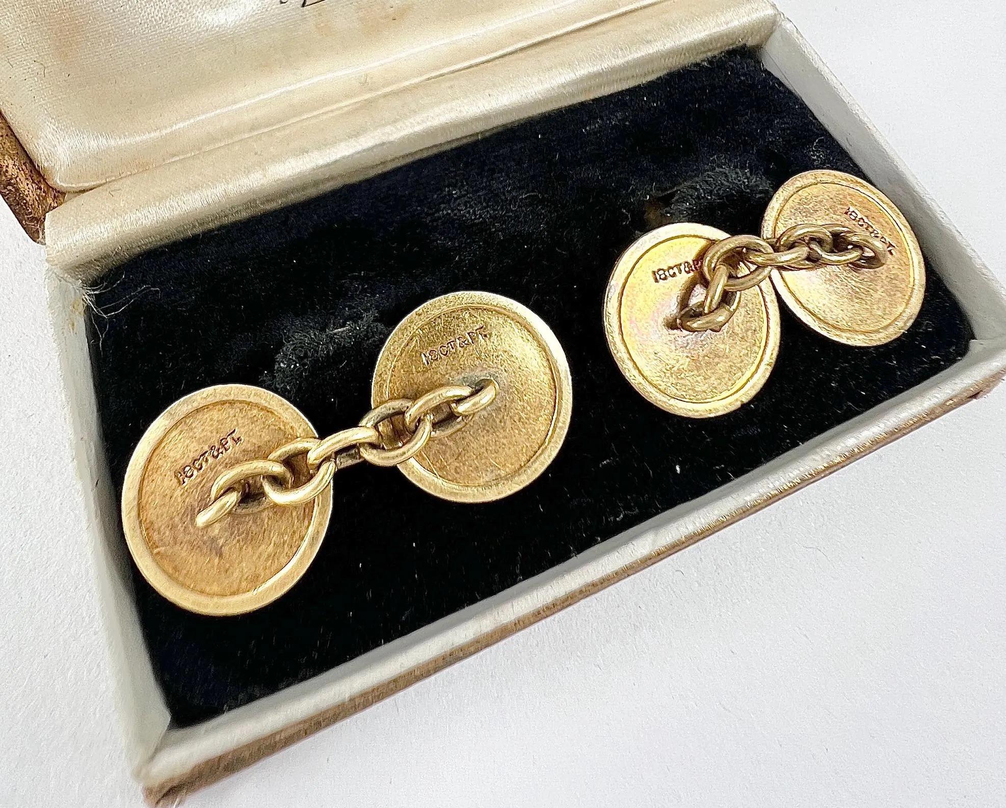 Antique Cufflinks 

18ct Gold & Platinum Stamped 

Circa 1920s

This striking pair of Art Deco cufflinks features a luxurious combination of 18ct yellow gold and platinum. Each cufflink showcases a meticulously crafted platinum centre elegantly