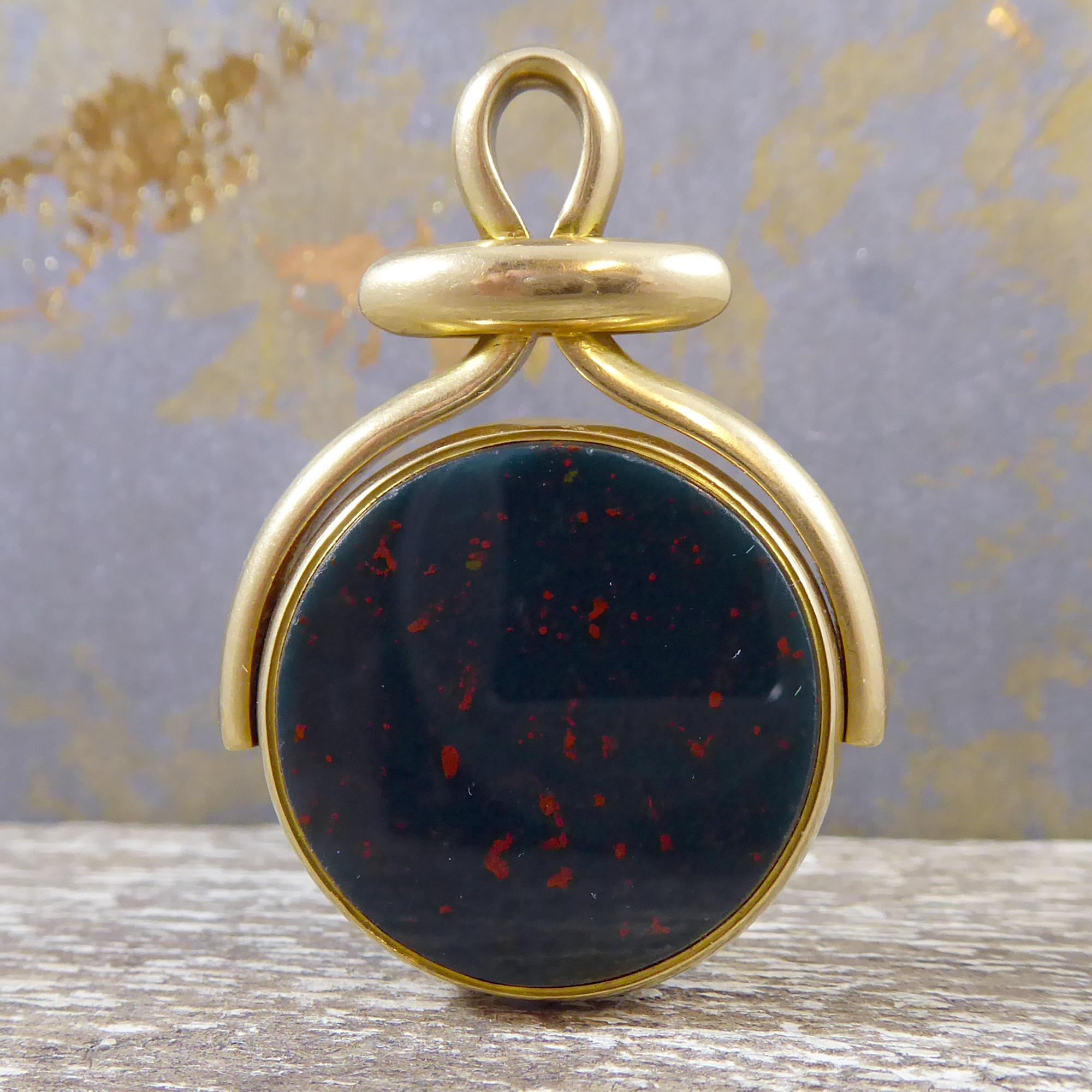 gold spinning fob pendant
