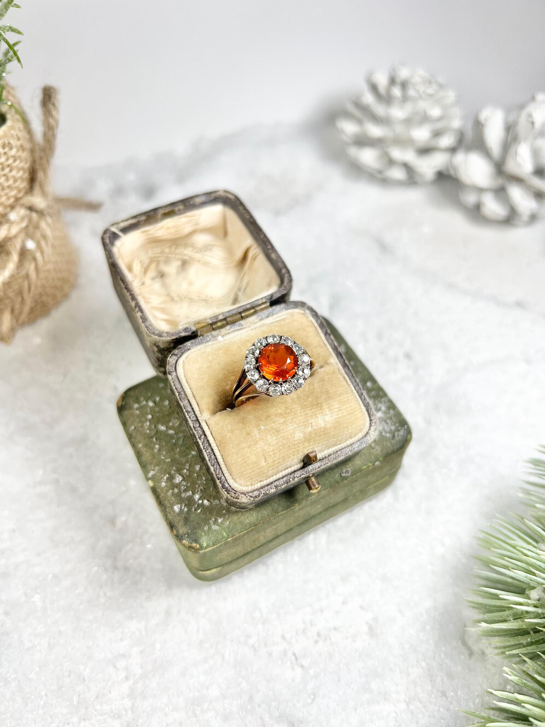 Antique Fire Opal Ring

18ct Gold 

Circa 1870

Fabulous, Victorian cluster ring. Set with the most beautiful, natural fire opal centre & gorgeous, cluster of old european cut diamonds. 
Set in 18ct yellow gold, mounted on a lovely three row, reeded