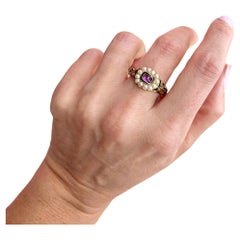 Ancienne bague commémorative victorienne en or 18ct à grenat cabachon et émail noir