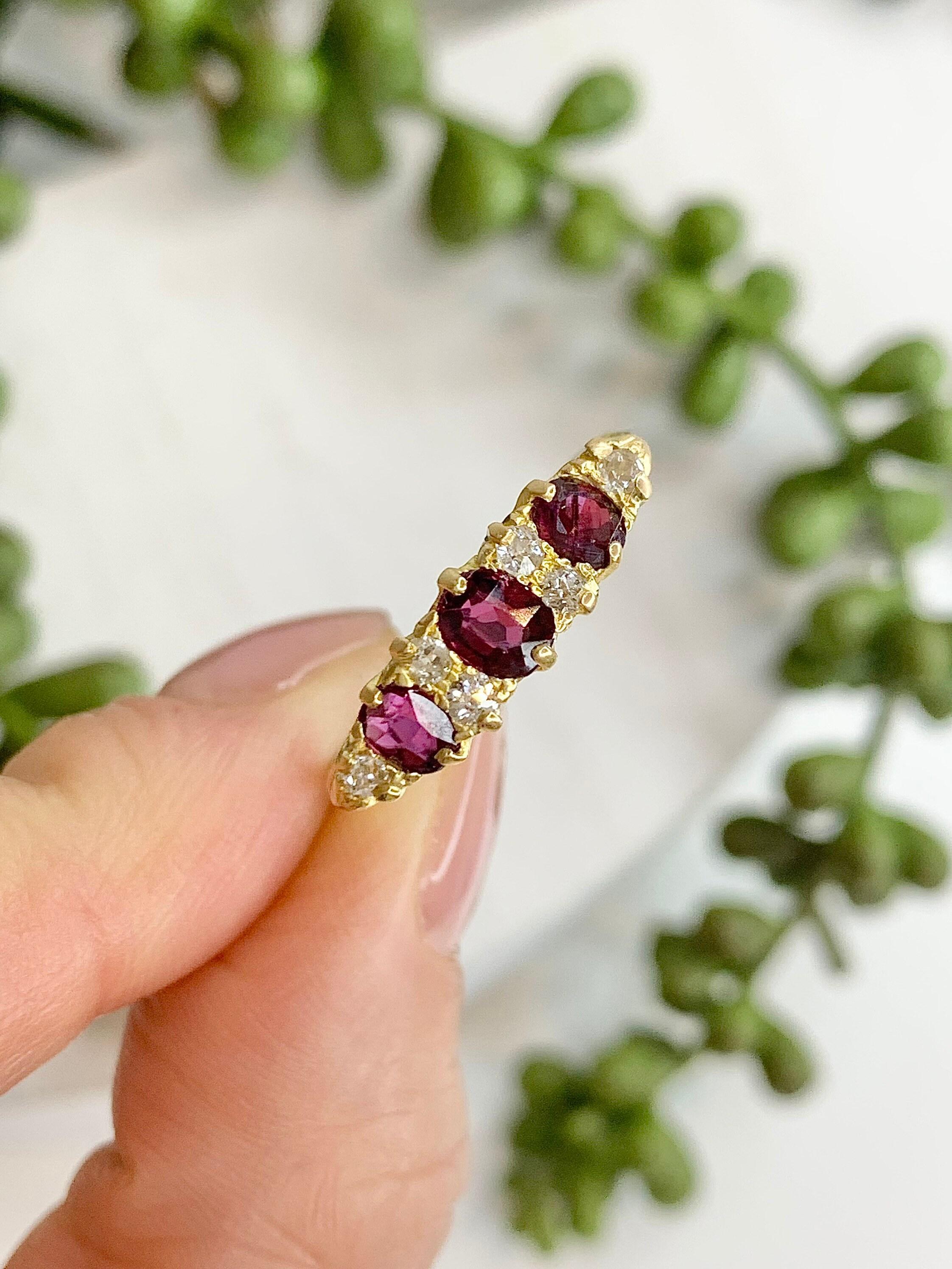 Antique Ruby & Diamond Carved Ring 

18ct Gold  Stamped 

Victorian Circa 1880 

Fabulous Victorian Hand Carved Ring with Scroll Detailing Set with 3 Gorgeous Rubies & Brilliant Cut Diamonds 

UK Size Q

US Size 8 1/4 

Can be resized using our