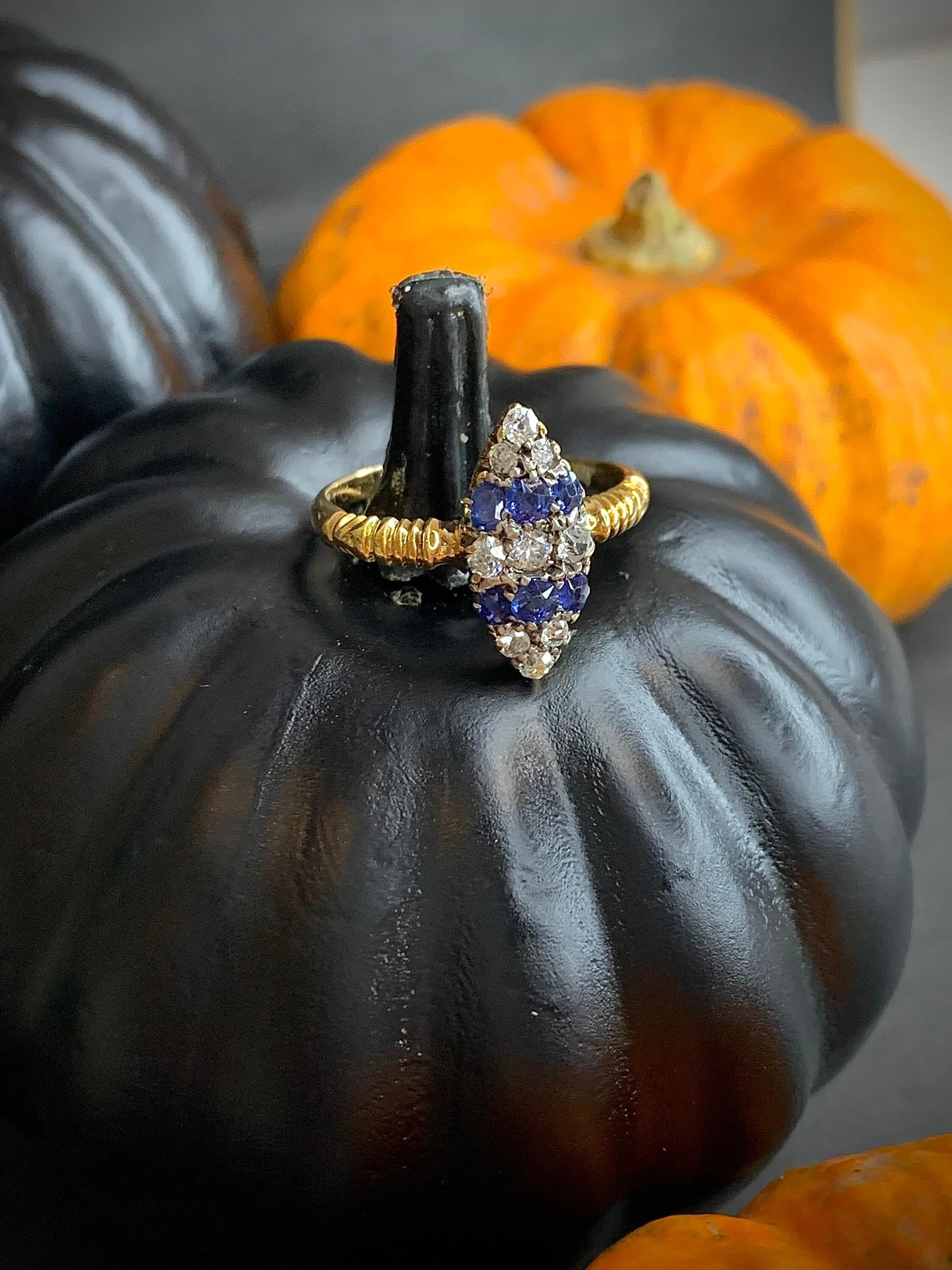 Antique Sapphire & Diamond Marquise Ring 

18ct Gold 

Victorian Circa 1880

Fabulous Marquise/Navette Shaped Ring. Set with Rows of Stunning Sapphires & Diamonds. Finished Beautifully with a Reeded Band 

Face of the ring measures approx 17mm x