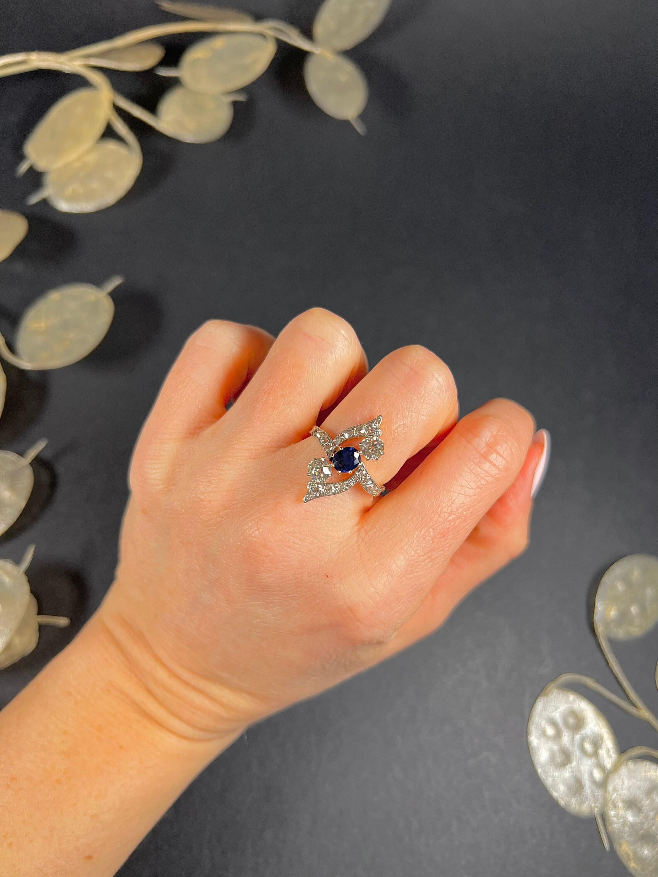 Antique Marquise Ring

18ct Gold Stamped

Circa 1880

Fabulous, Victorian marquise shaped ring. Set with a centre, oval, faceted, natural sapphire & two natural, round diamonds. The beautiful crossover setting is full of sparkling natural diamonds