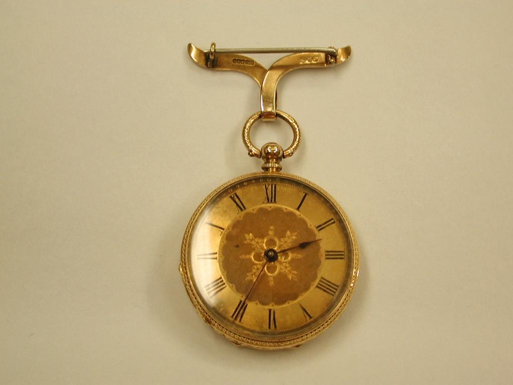 Antique 18ct Ladies Enamelled Watch with 9ct Pinned Bow circa 1890
Very pretty 18ct gold ladies fob watch is marked 18K, a swiss movement and  is circa 1890 with 9ct bow 
and pin dated 1912 with original key which winds and alters the time.
The