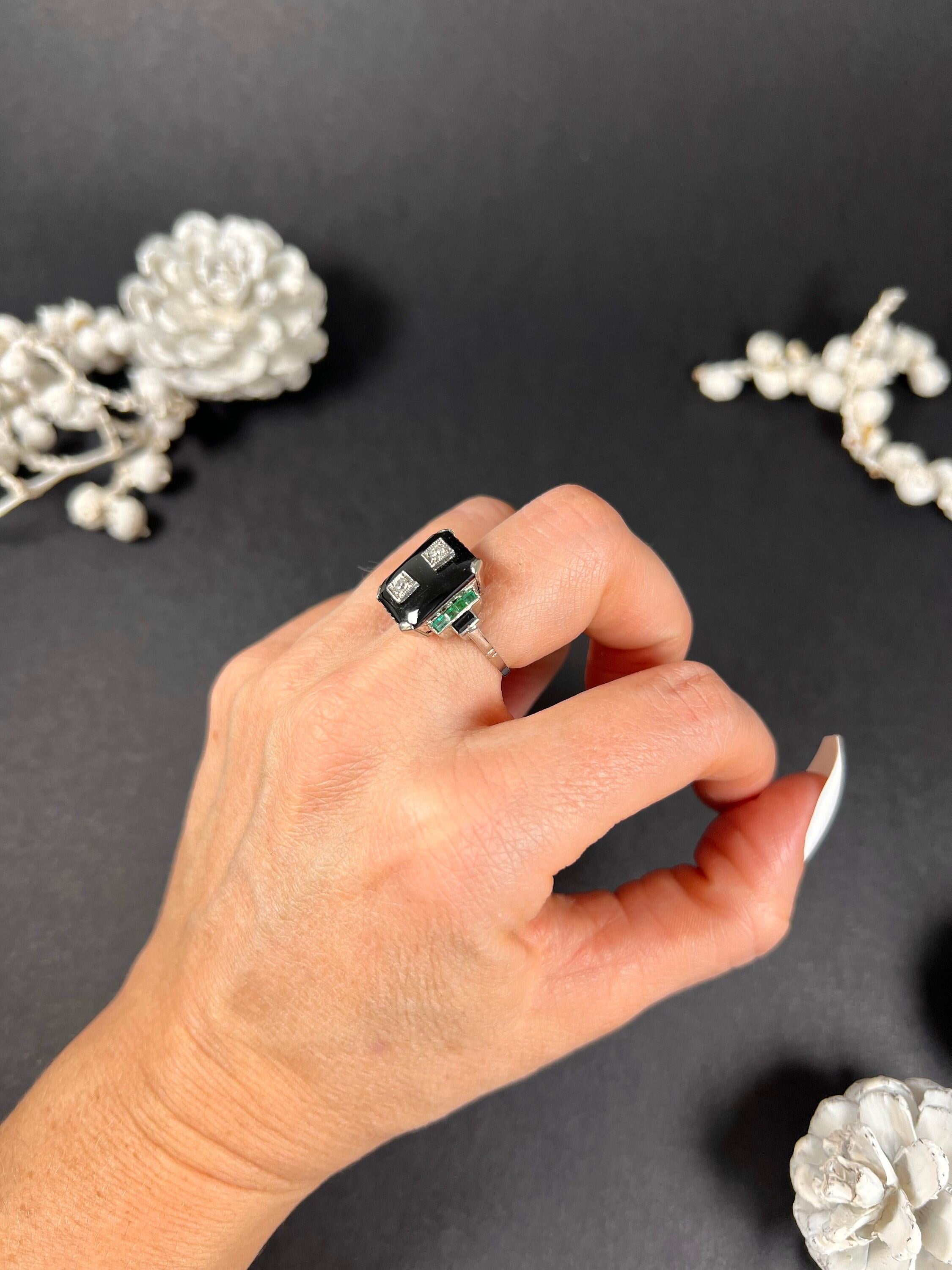 Antique Onyx Ring

18ct White Gold Tested

Circa 1920’s 

This stunning Art Deco onyx ring is a true antique beauty. Crafted from 18ct white gold, this ring boasts a striking geometric design that captures the essence of the Art Deco era. The ring
