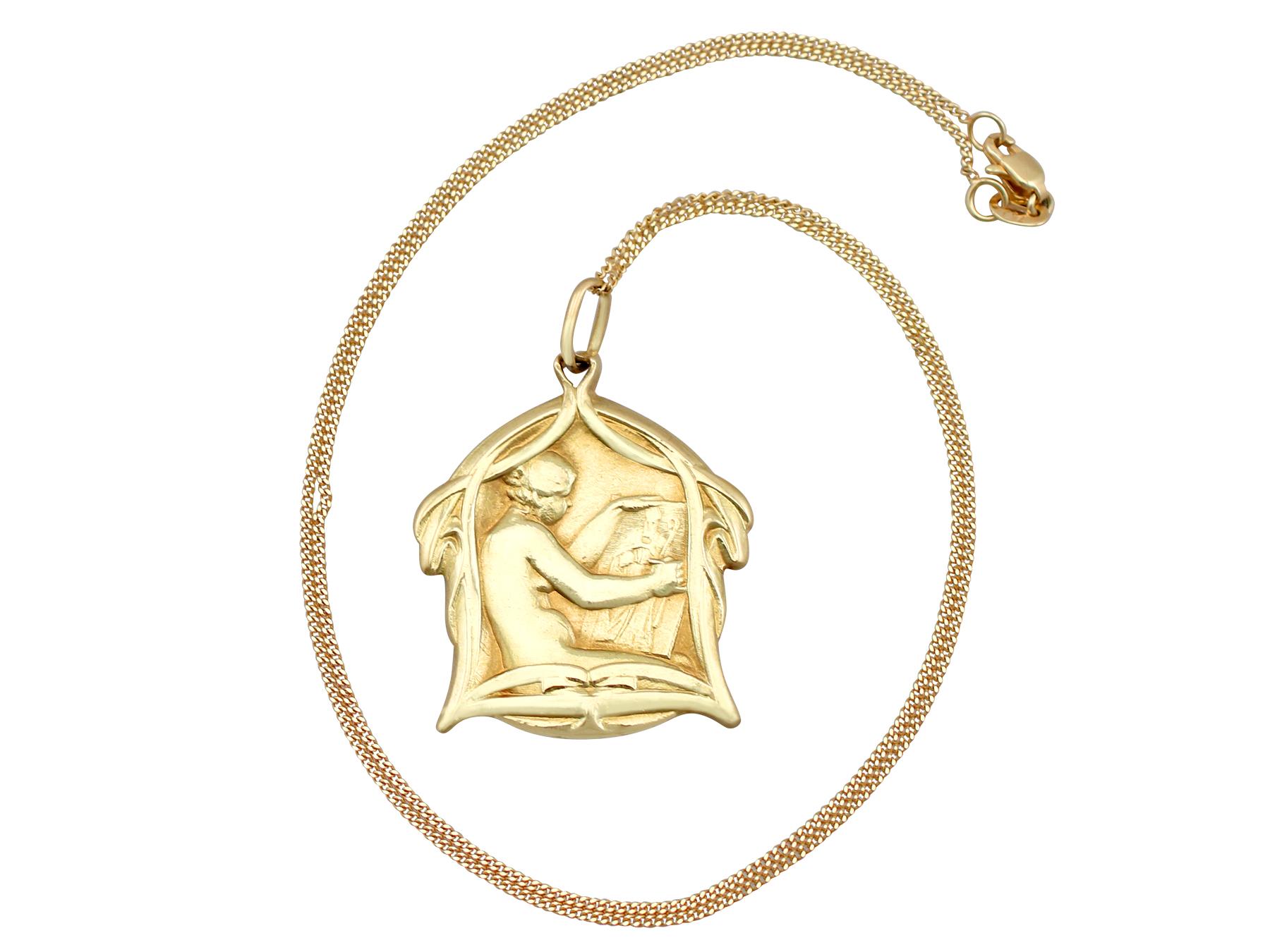 An impressive antique Belgian 18 karat yellow gold Art Nouveau pendant and chain by 'Fernan Du Bois'; part of our diverse antique jewelry and estate jewelry collections.

This fine and impressive antique Belgian pendant has been crafted in 18k