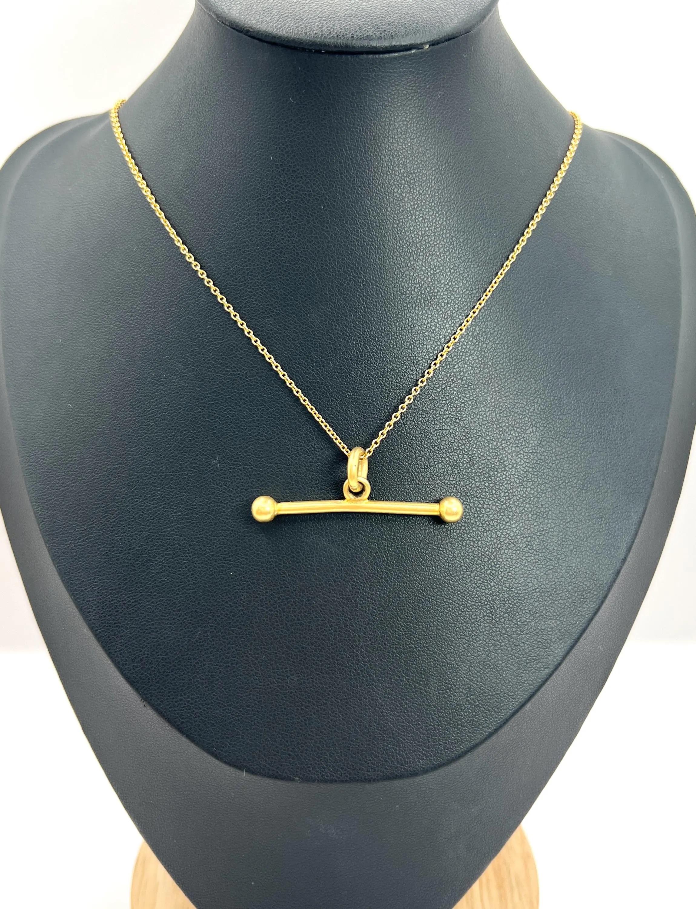 Antique Gold T-bar

18ct Yellow Gold

Circa 1910

* The gold chain is sold separately. 
 
Perfect for adding a vintage flair to your collection, this T-Bar would look fabulous suspended from one of our antique gold chains, making it a unique