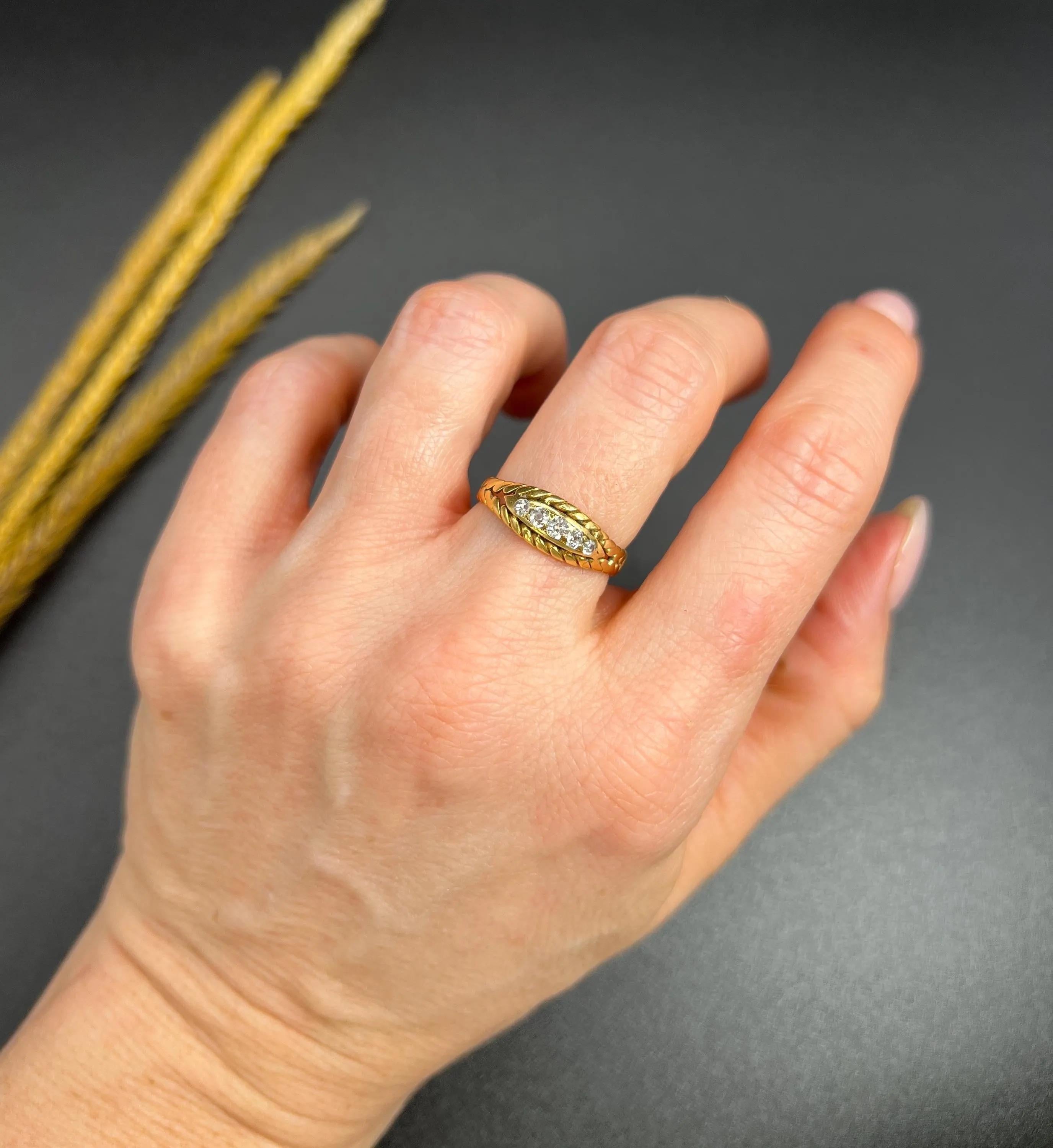Antique Gypsy Ring

18ct Yellow Gold 

Circa 1900

Introducing a stunning 18ct Yellow Gold Edwardian Ring, showcasing a fabulous rope-effect design that captures the essence of timeless elegance. This exquisite piece features five sparkling old-cut