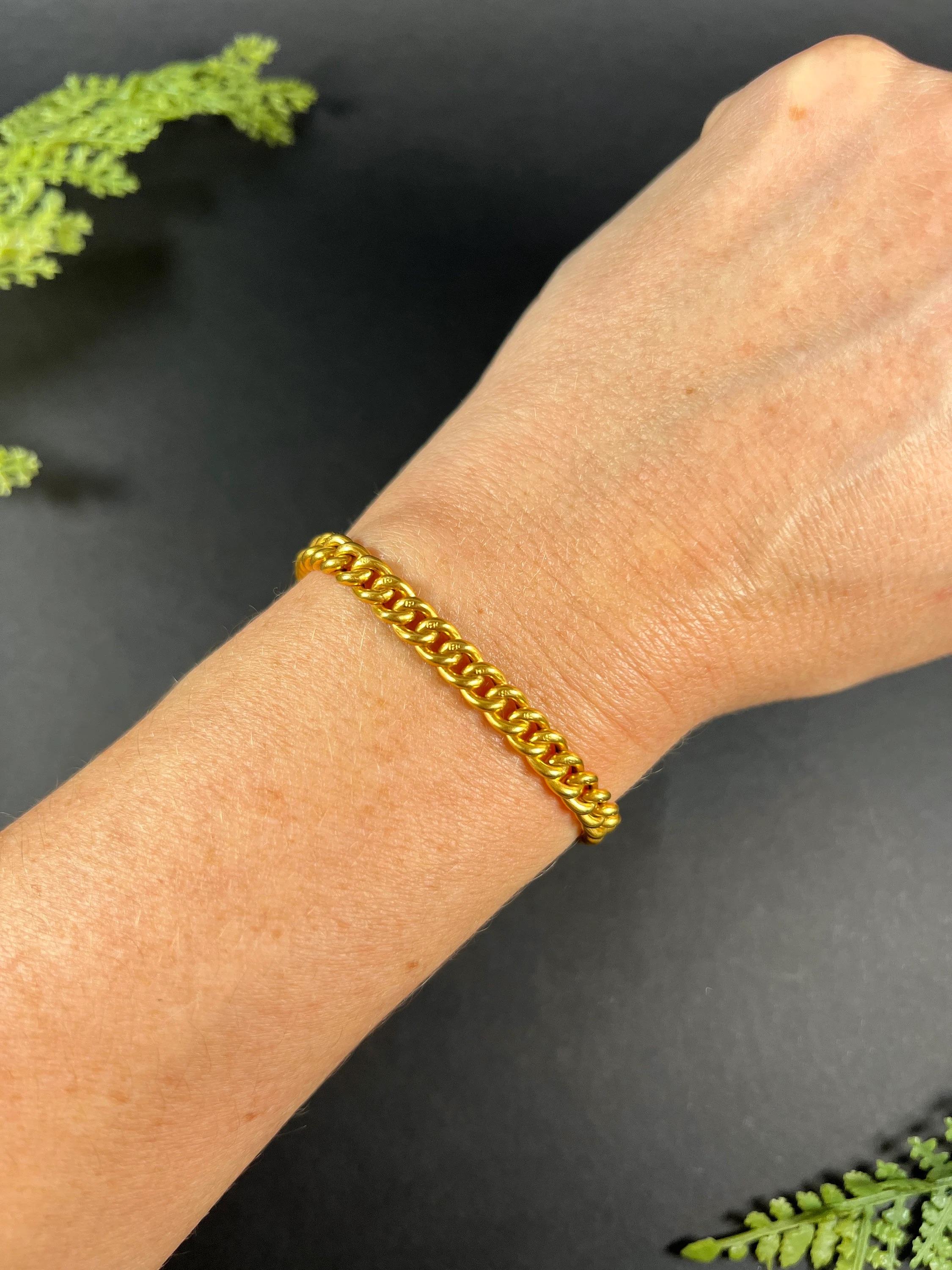 Antique Curb Bracelet 

18ct Yellow Gold Stamped

Circa 1900

This exquisite 18ct yellow gold Edwardian curb link bracelet is a true antique masterpiece. Every single link in this bracelet is stamped with 18c, which is a testament to the quality and