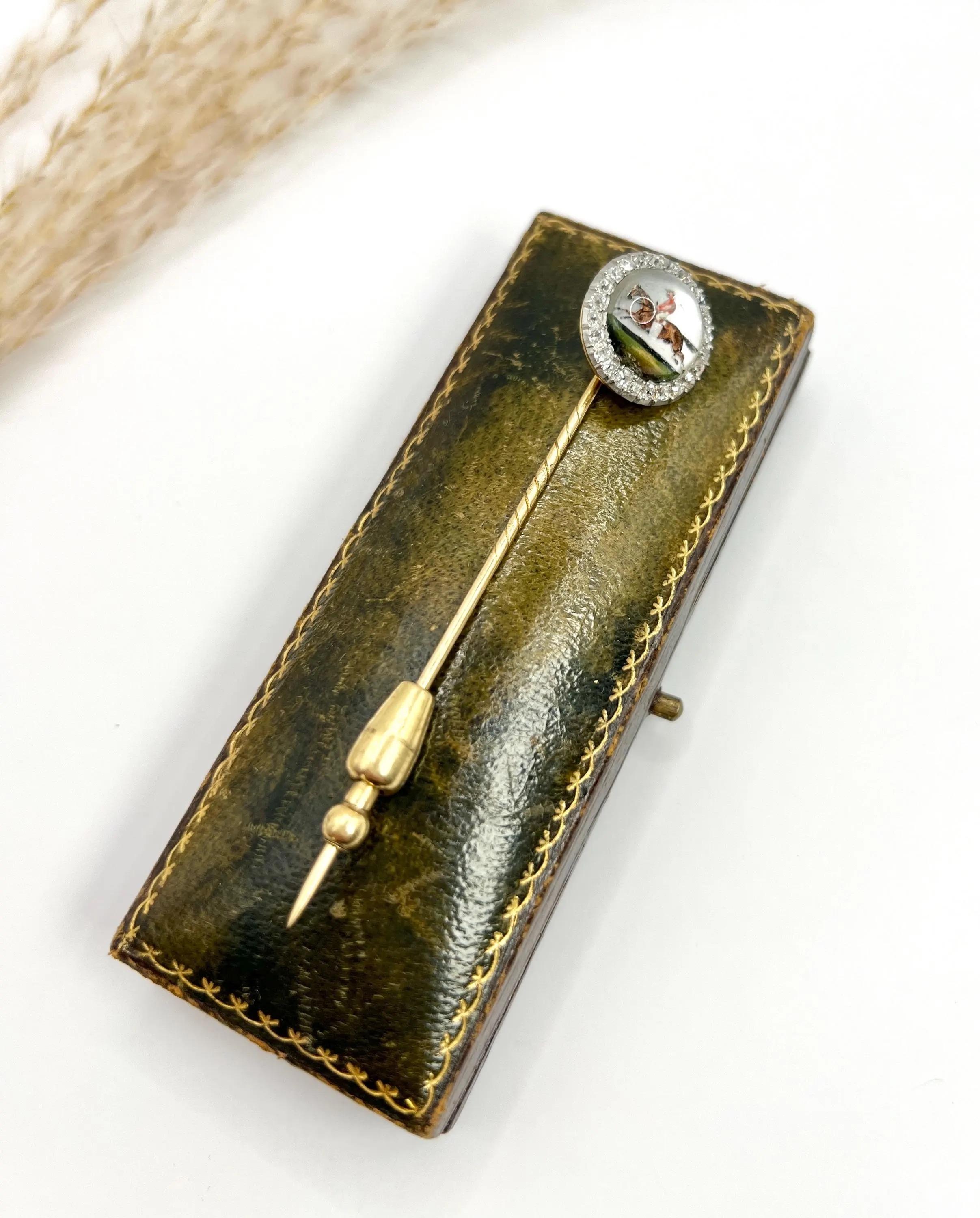 Antique Stick Pin

18ct Yellow Gold

Circa 1900

This exquisite 18ct Gold Edwardian Stick Pin is a true masterpiece, perfect for any racing enthusiast. Featuring a beautifully crafted design of a racehorse and jockey encapsulated in striking round