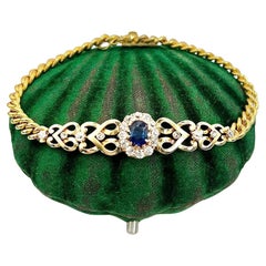 Antiguo brazalete de oro amarillo de 18 ct, zafiro eduardiano y racimo de diamantes en forma de corazón