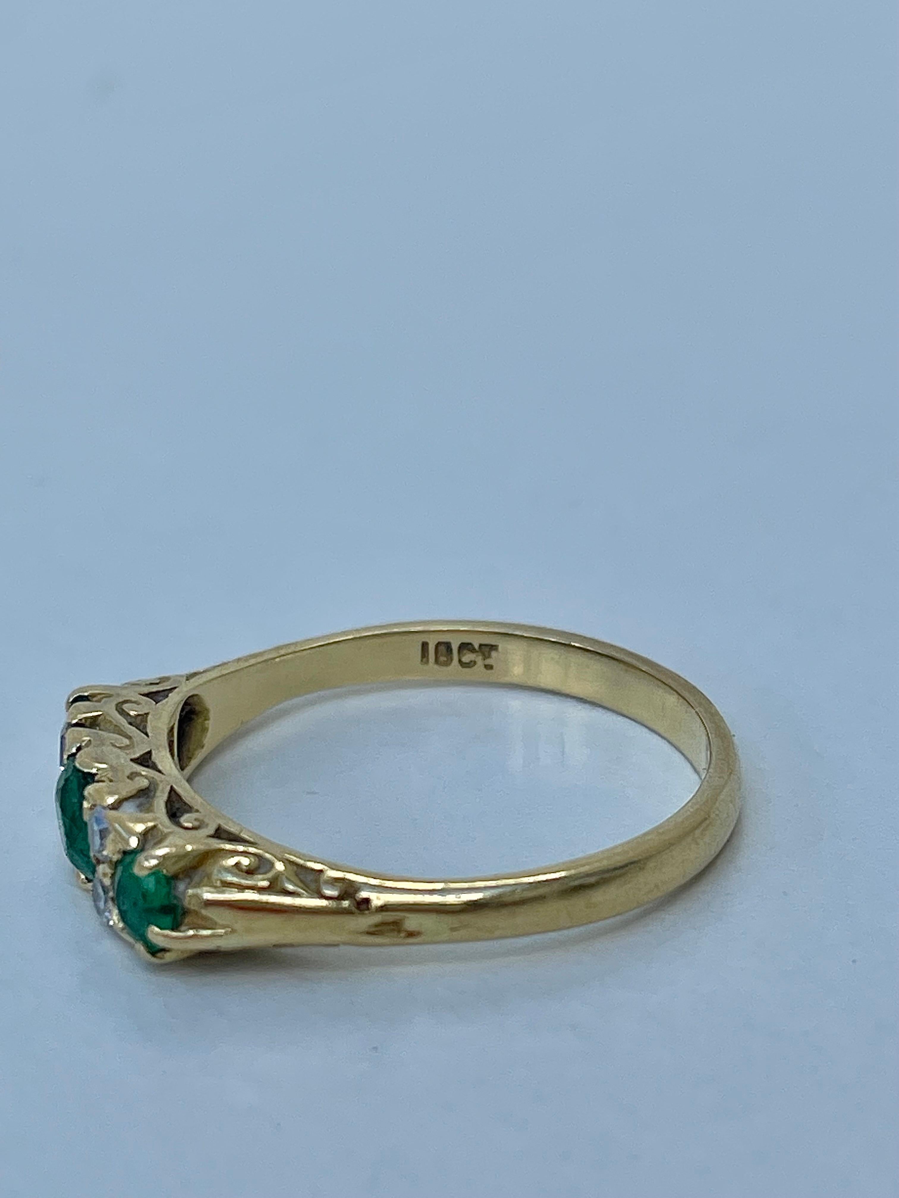 Antique 18ct Yellow Gold Emerald and Diamond Ring 

most beautiful and elegant multi stone ring with a lovely detailed scroll 

The item comes without the box in the photos but will be presented in a gift box

Measurements: weight 3.91g, size UK Q,