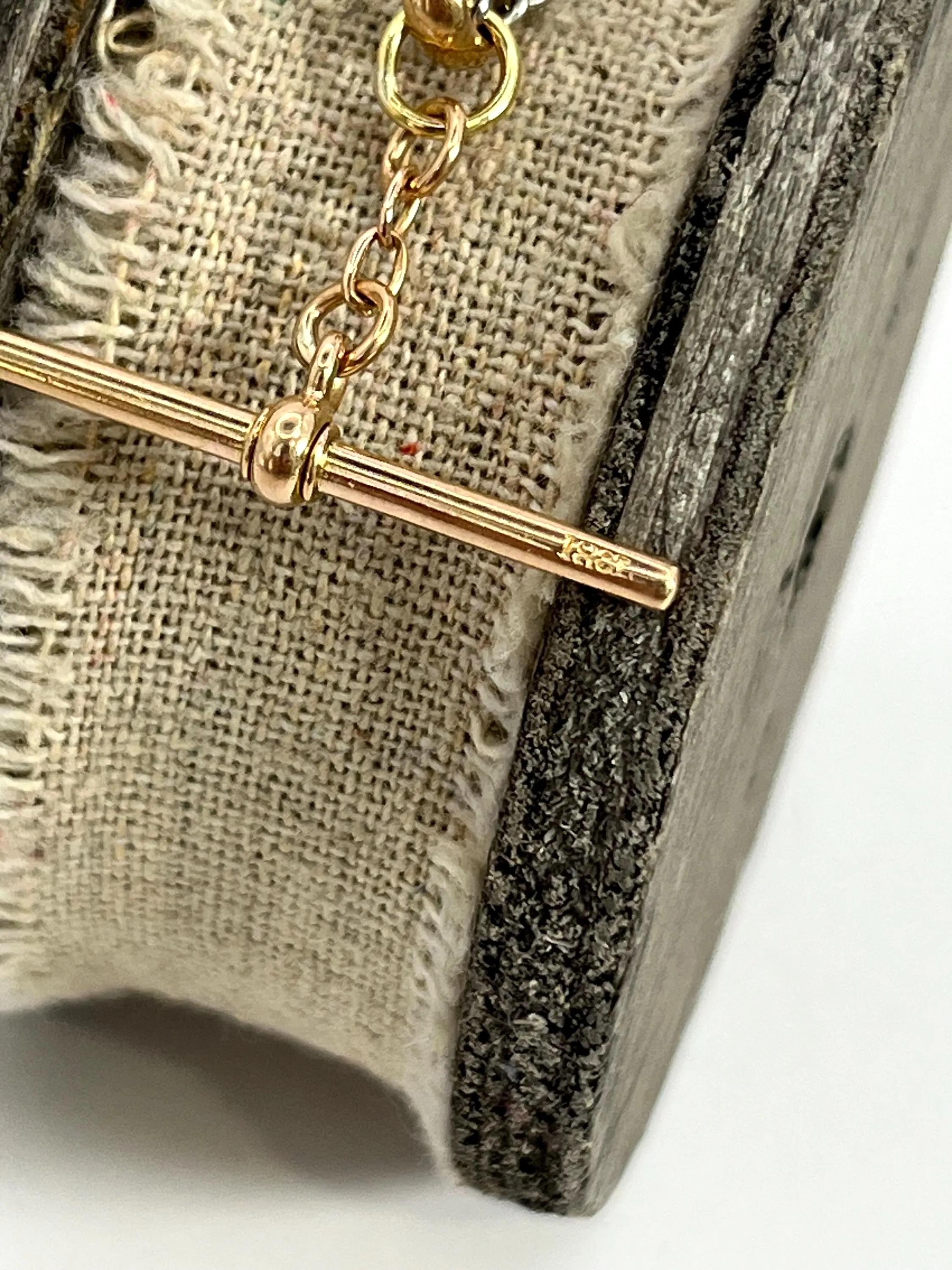 Antiguo brazalete de eslabones con barra en T, de oro amarillo de 18 ct y platino, circa 1910 en Bueno estado para la venta en Brighton, GB