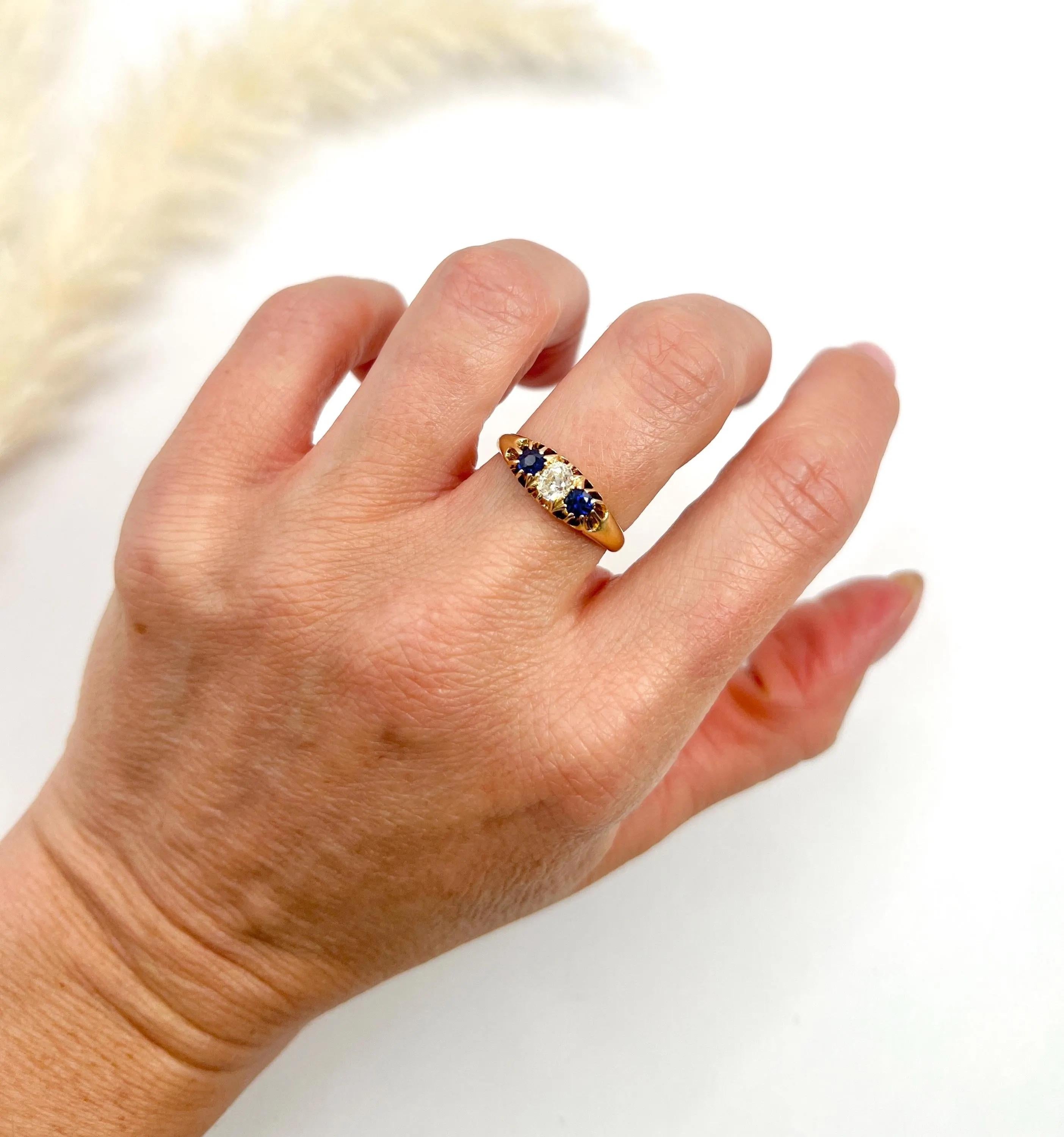 Antique Sapphire Ring 

18ct Yellow Gold  

Hallmarked Birmingham 1908

Makers Mark W G & S

This exquisite ring features a stunning 18ct yellow gold setting, hallmarked Birmingham , ensuring its authenticity and historical significance. The