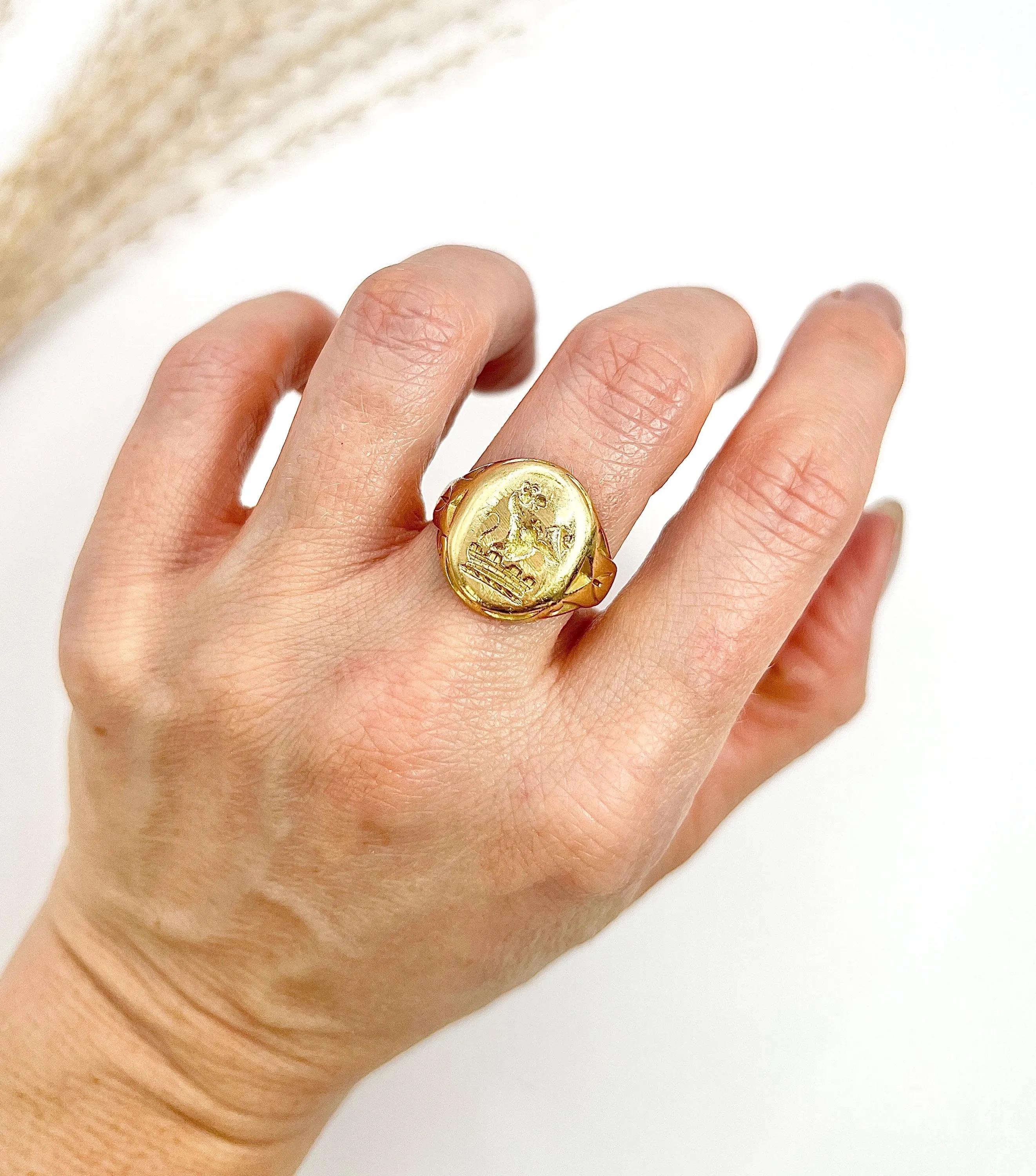Antique Signet Ring

18ct Gold 

Circa 1890

Discover a stunning piece of history with this exquisite 18ct yellow gold Victorian-era signet ring. Featuring a beautifully engraved intaglio design of a roaring lion rampant and royal crown, this ring